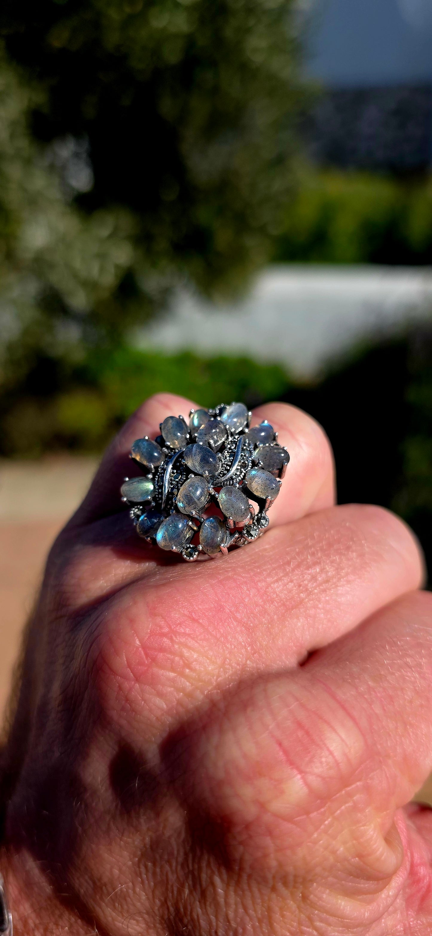 This breathtaking sterling silver statement ring is a celebration of nature's most magical gemstone — spectacular labradorite!