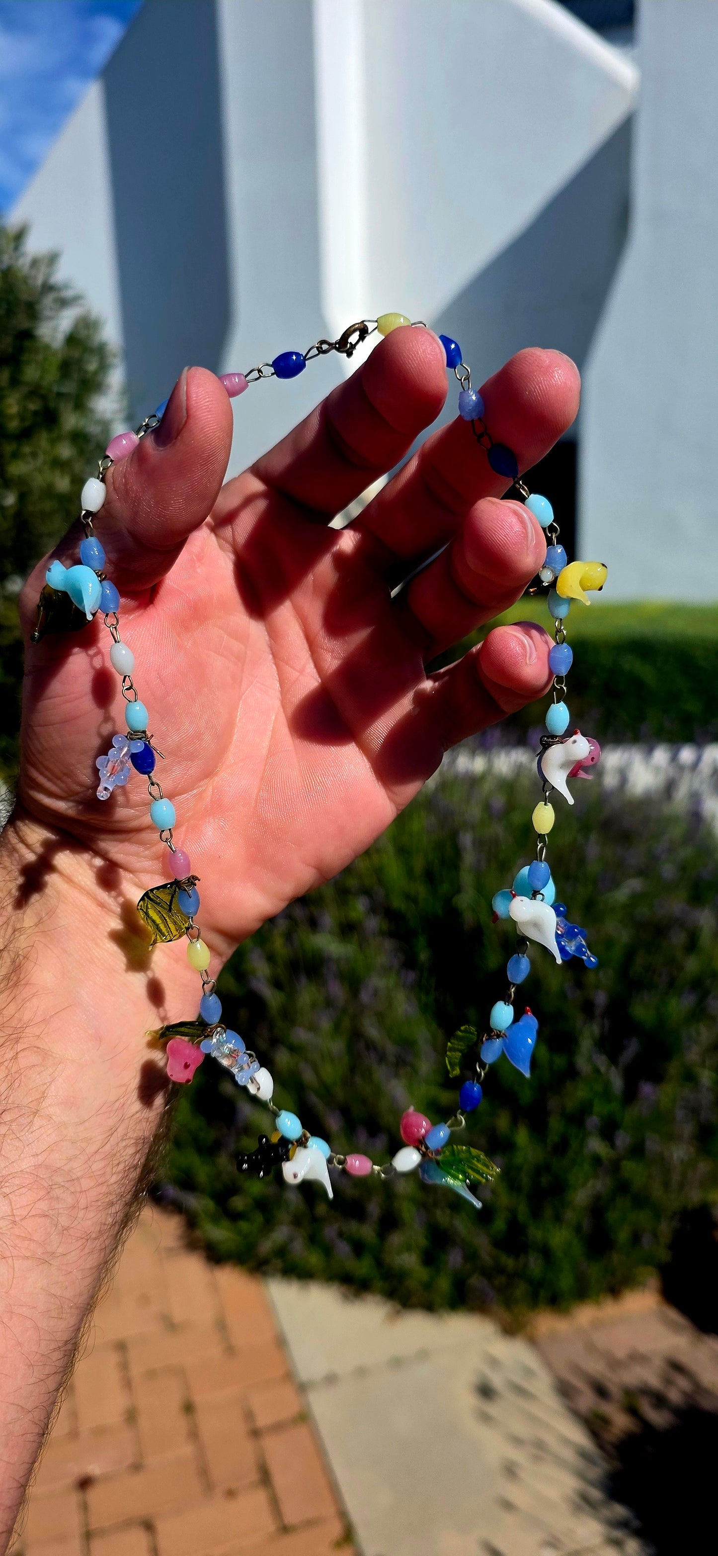 A truly enchanting and increasingly scarce treasure... this rare 1930s Art Deco Murano glass necklace is a delightful celebration of Venetian artistry and colour.
