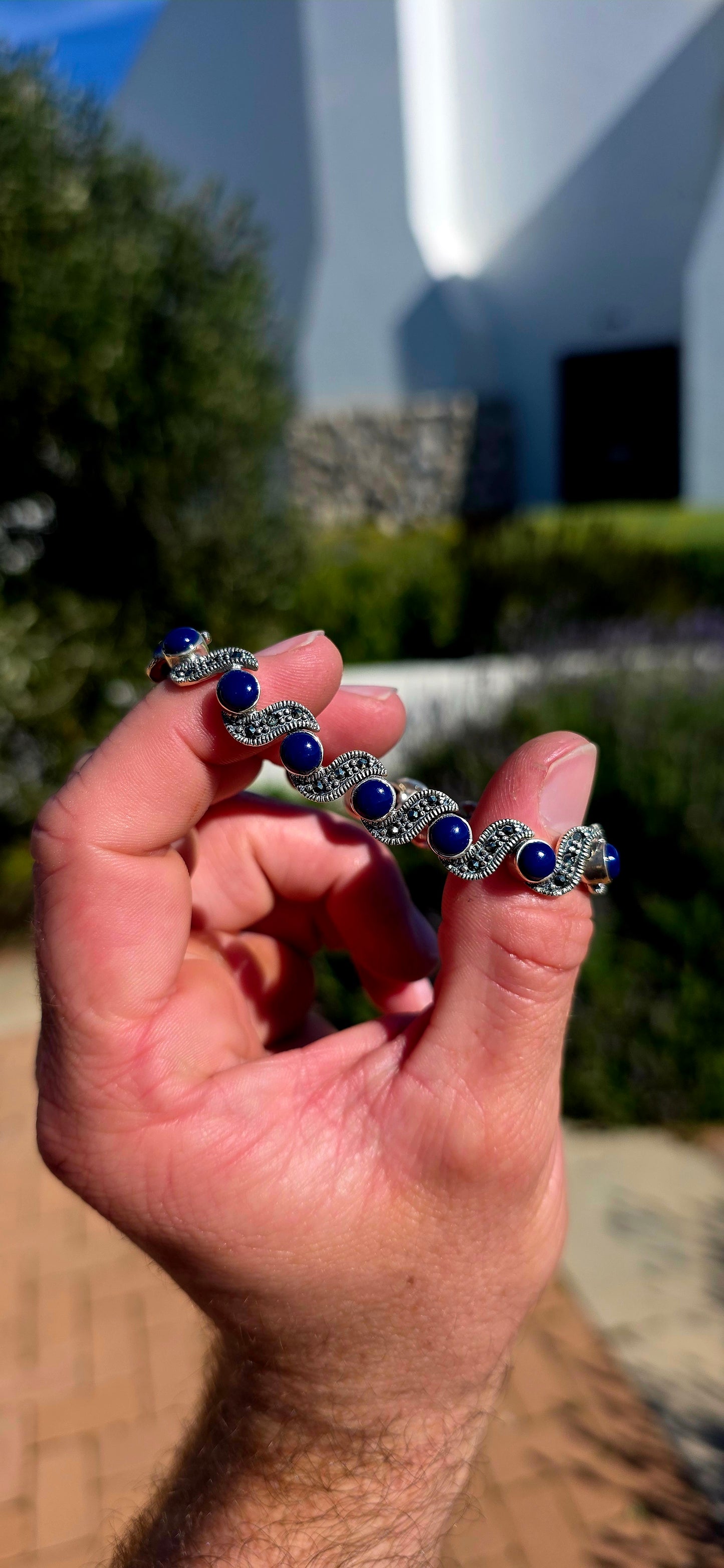 This beautiful Art Deco Revival sterling silver bracelet captures the glamour of the 1920s with a contemporary twist.