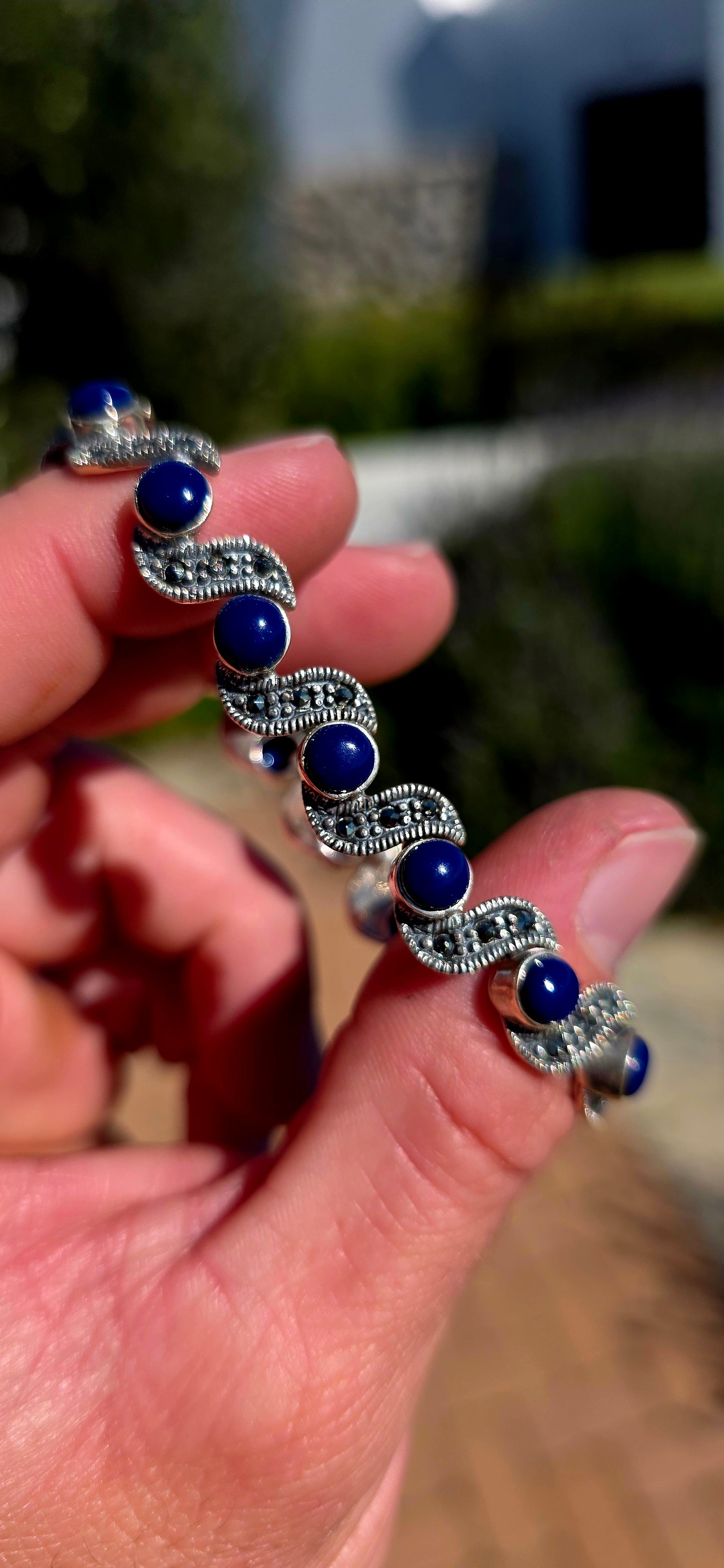 This beautiful Art Deco Revival sterling silver bracelet captures the glamour of the 1920s with a contemporary twist.