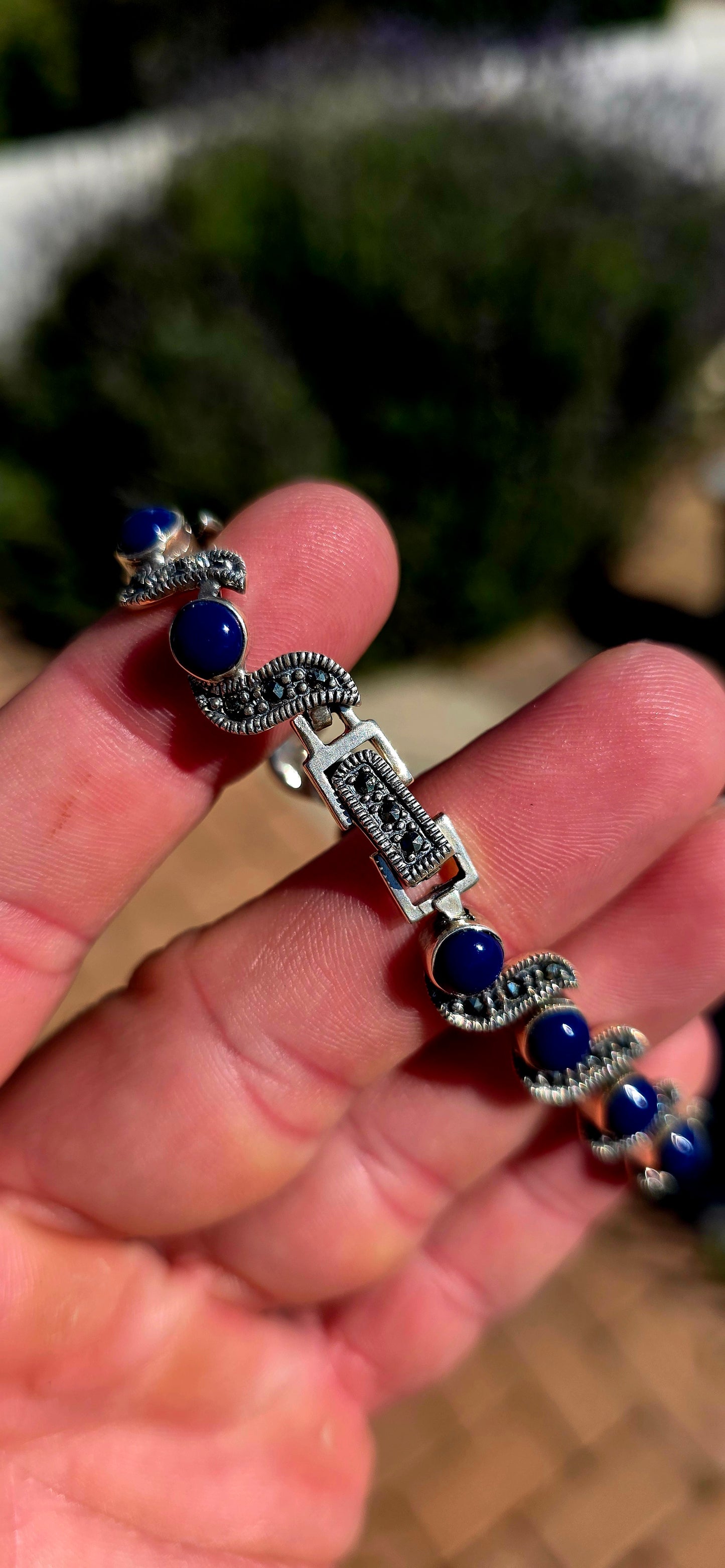 This beautiful Art Deco Revival sterling silver bracelet captures the glamour of the 1920s with a contemporary twist.