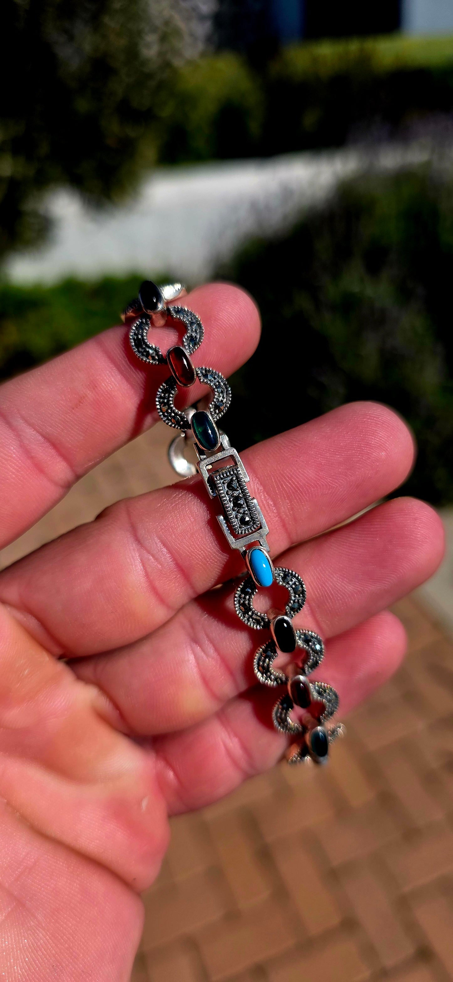 Colourful, sophisticated, and wonderfully nostalgic... this beautiful sterling silver Art Deco Revival bracelet celebrates one of the most iconic jewellery styles of the 1920s.