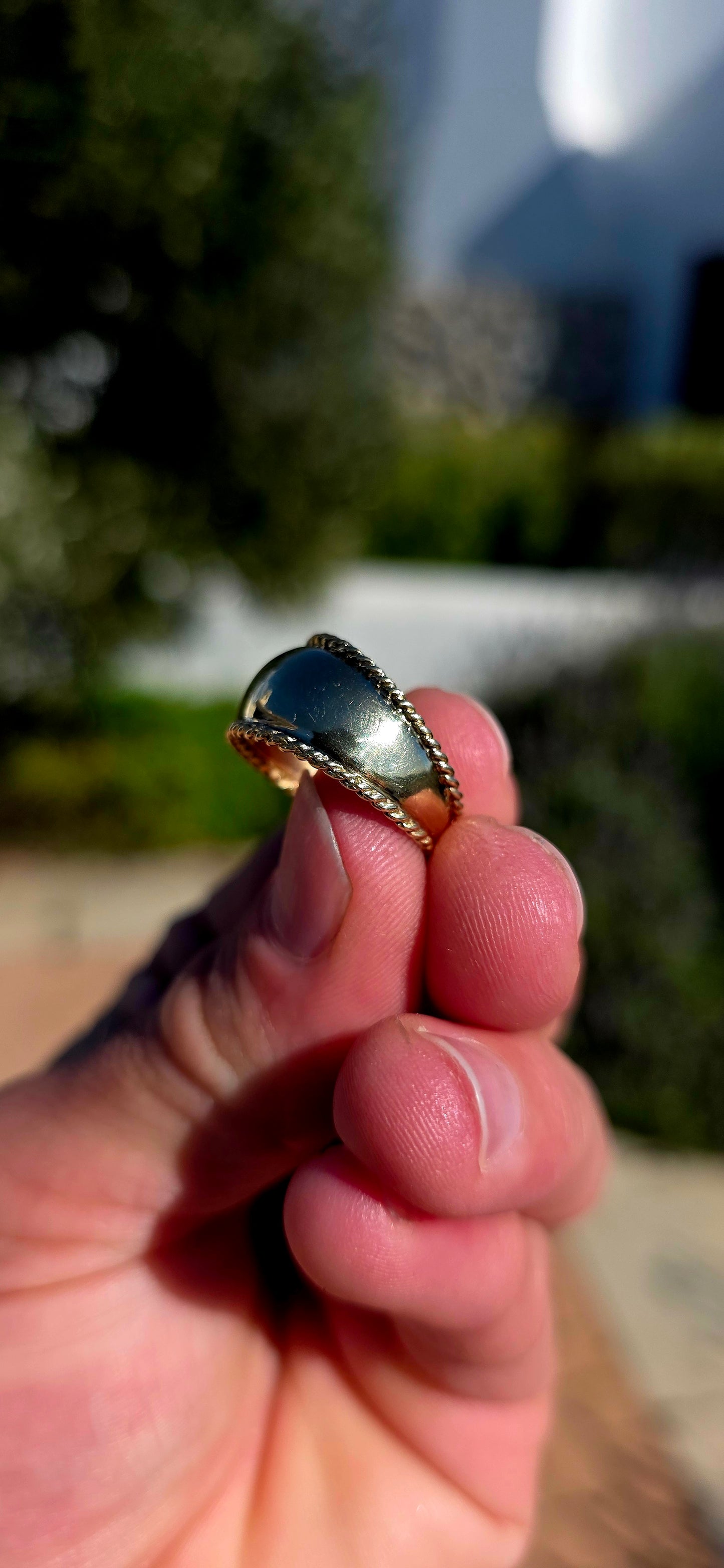 There is something undeniably sophisticated about a beautifully crafted gold band... and this solid 9ct yellow gold statement ring is the perfect example.