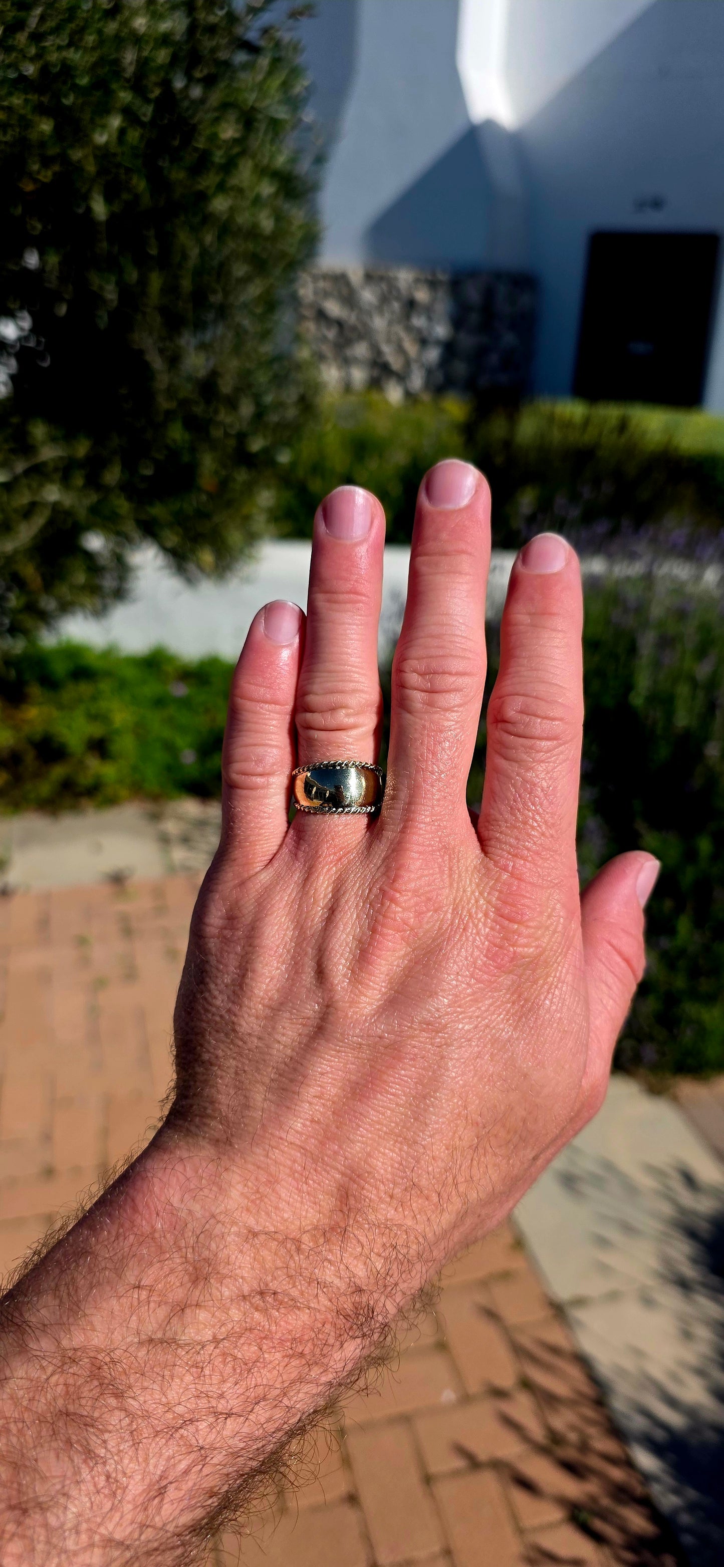 There is something undeniably sophisticated about a beautifully crafted gold band... and this solid 9ct yellow gold statement ring is the perfect example.