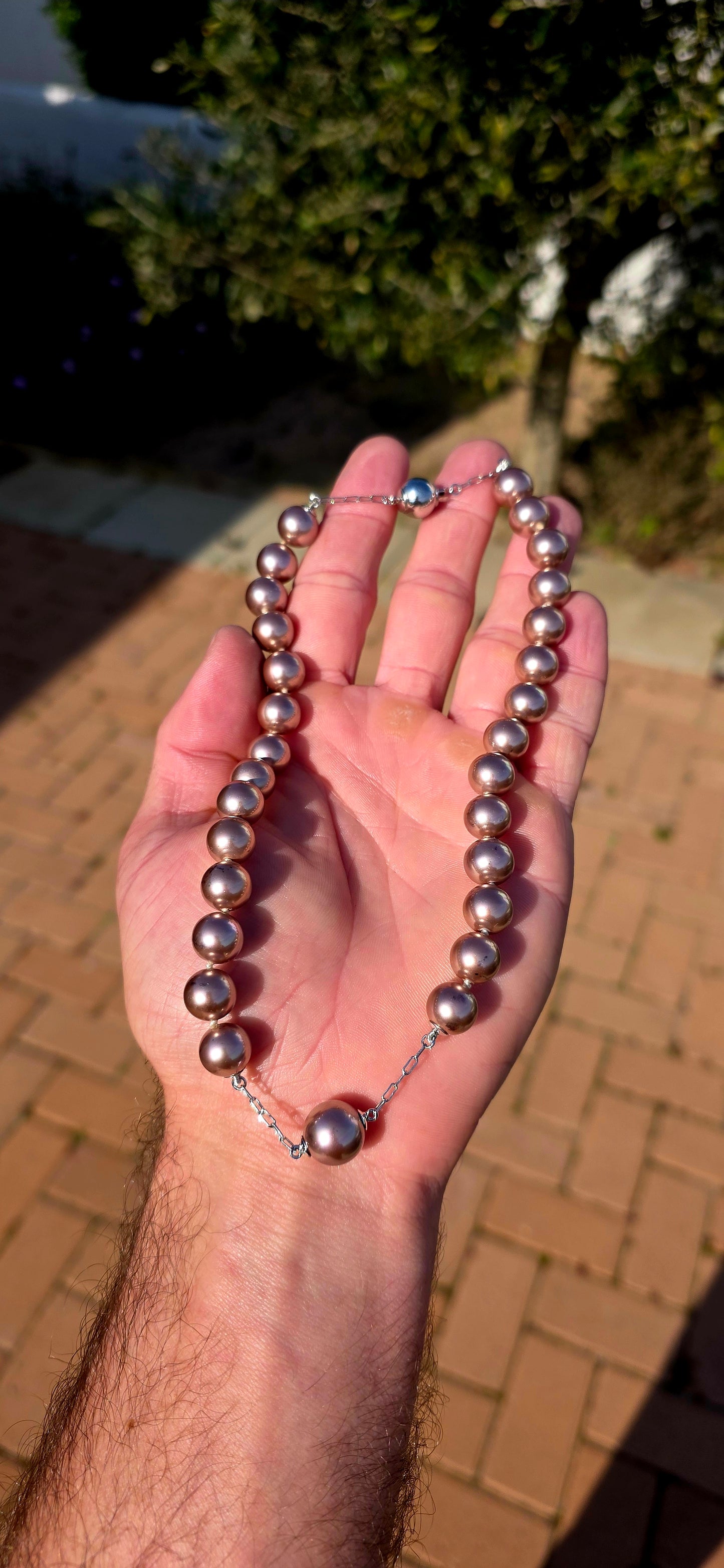 This beautiful designer costume jewellery necklace pairs the beauty of pearls with sleek sterling silver detailing, creating a piece that feels both classic and refreshingly modern.