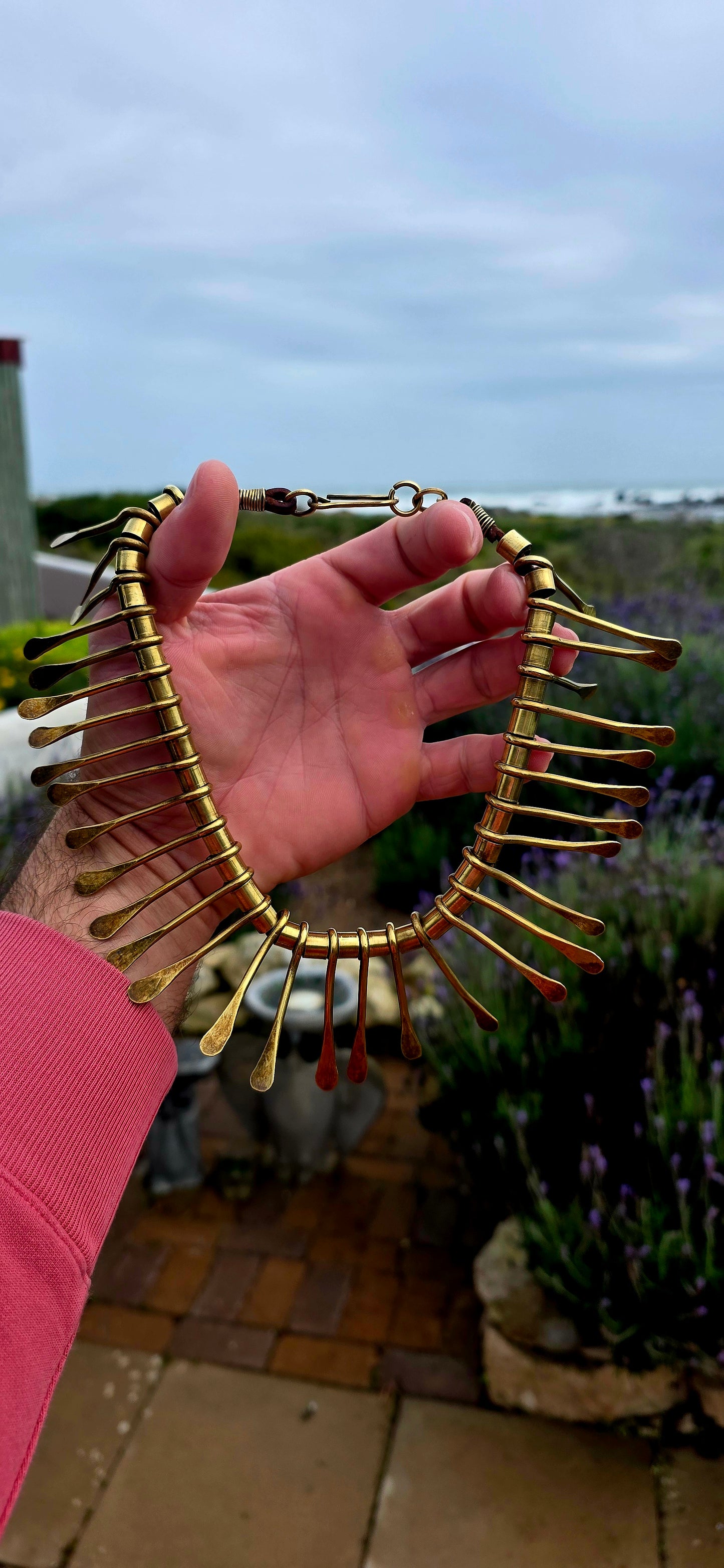 This incredible 1970s artisan-crafted statement necklace channels unmistakable Cleopatra vibes, blending ancient-inspired design with the fearless bohemian glamour that defined the decade.