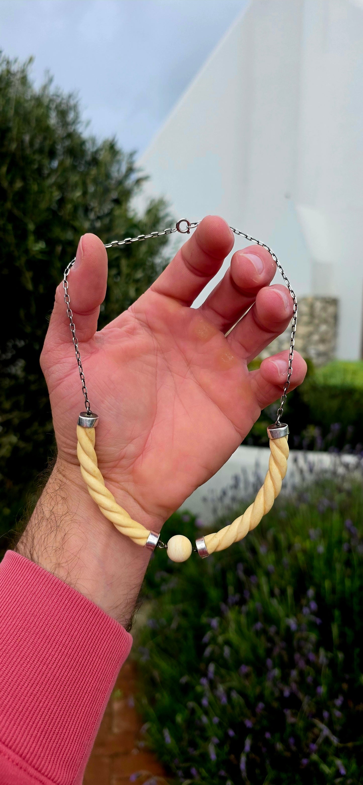 Wonderfully sculptural and effortlessly elegant the necklace combines the warm creamy tones of pre-ban carved ivory with the cool sophistication of sterling silver, creating a piece that feels every bit as stylish today as it did nearly a century ago.