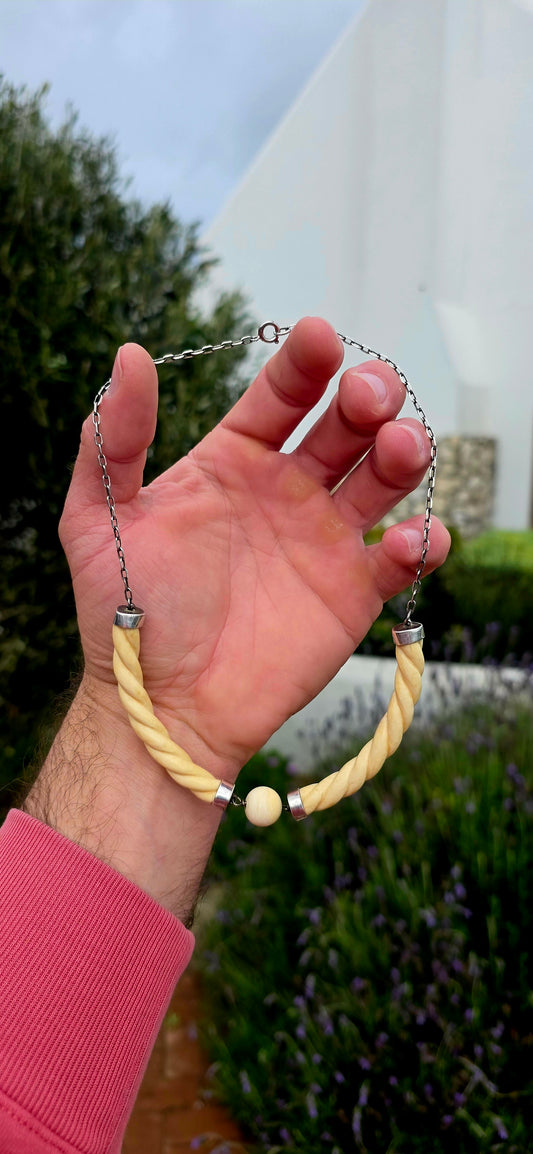 Wonderfully sculptural and effortlessly elegant the necklace combines the warm creamy tones of pre-ban carved ivory with the cool sophistication of sterling silver, creating a piece that feels every bit as stylish today as it did nearly a century ago.