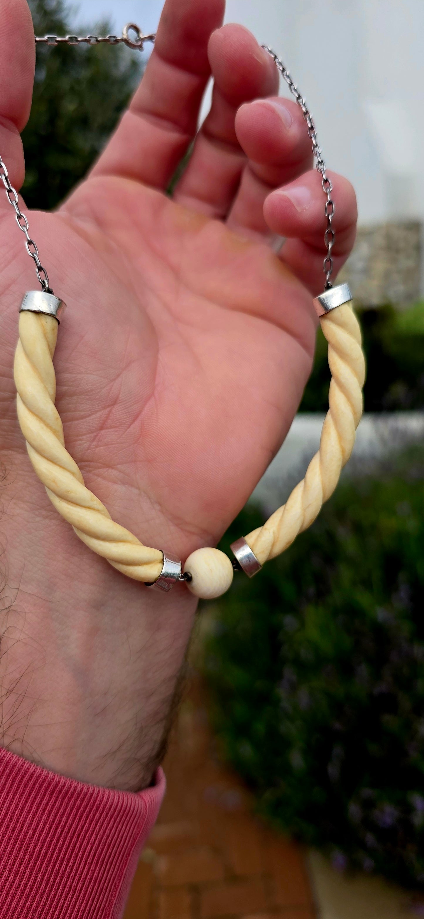 Wonderfully sculptural and effortlessly elegant the necklace combines the warm creamy tones of pre-ban carved ivory with the cool sophistication of sterling silver, creating a piece that feels every bit as stylish today as it did nearly a century ago.