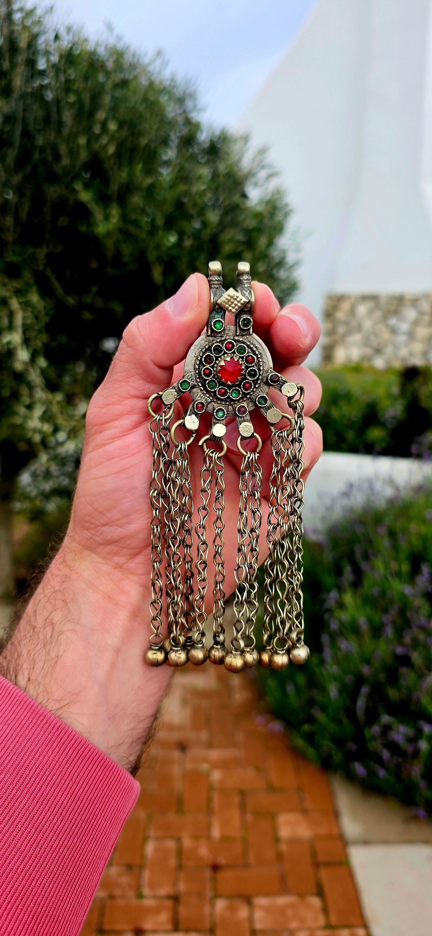 Bold, beautifully expressive, and steeped in nomadic tradition... this large vintage Afghan Kuchi tribal pendant is a striking statement piece that celebrates the rich artistry of Central Asia.