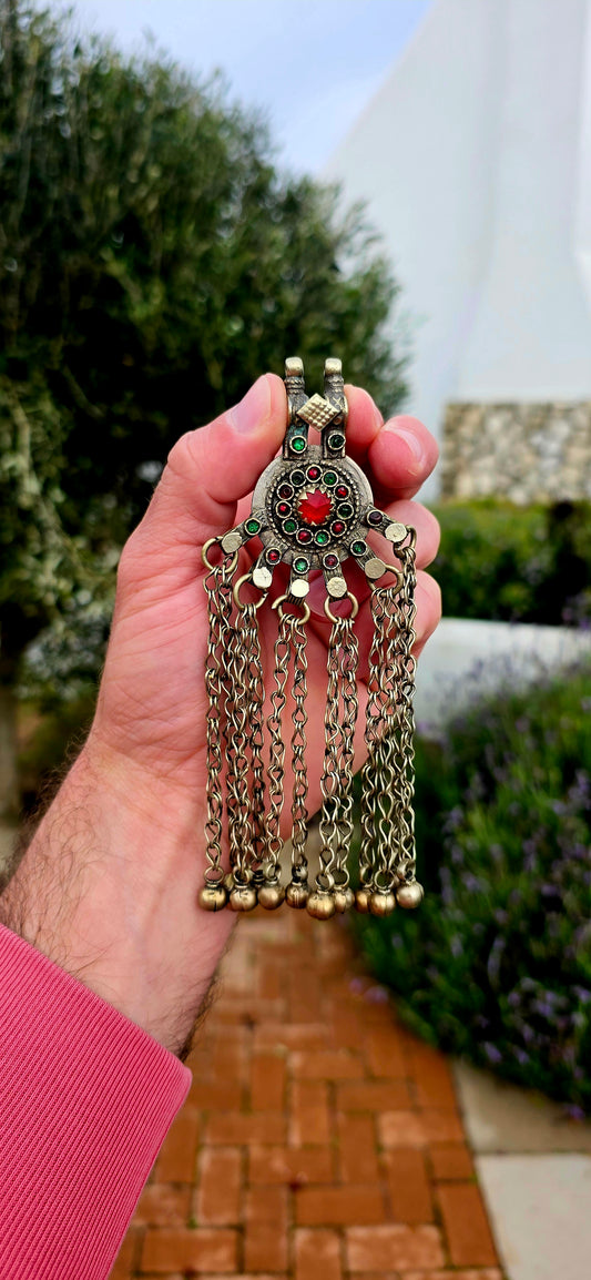 Bold, beautifully expressive, and steeped in nomadic tradition... this large vintage Afghan Kuchi tribal pendant is a striking statement piece that celebrates the rich artistry of Central Asia.