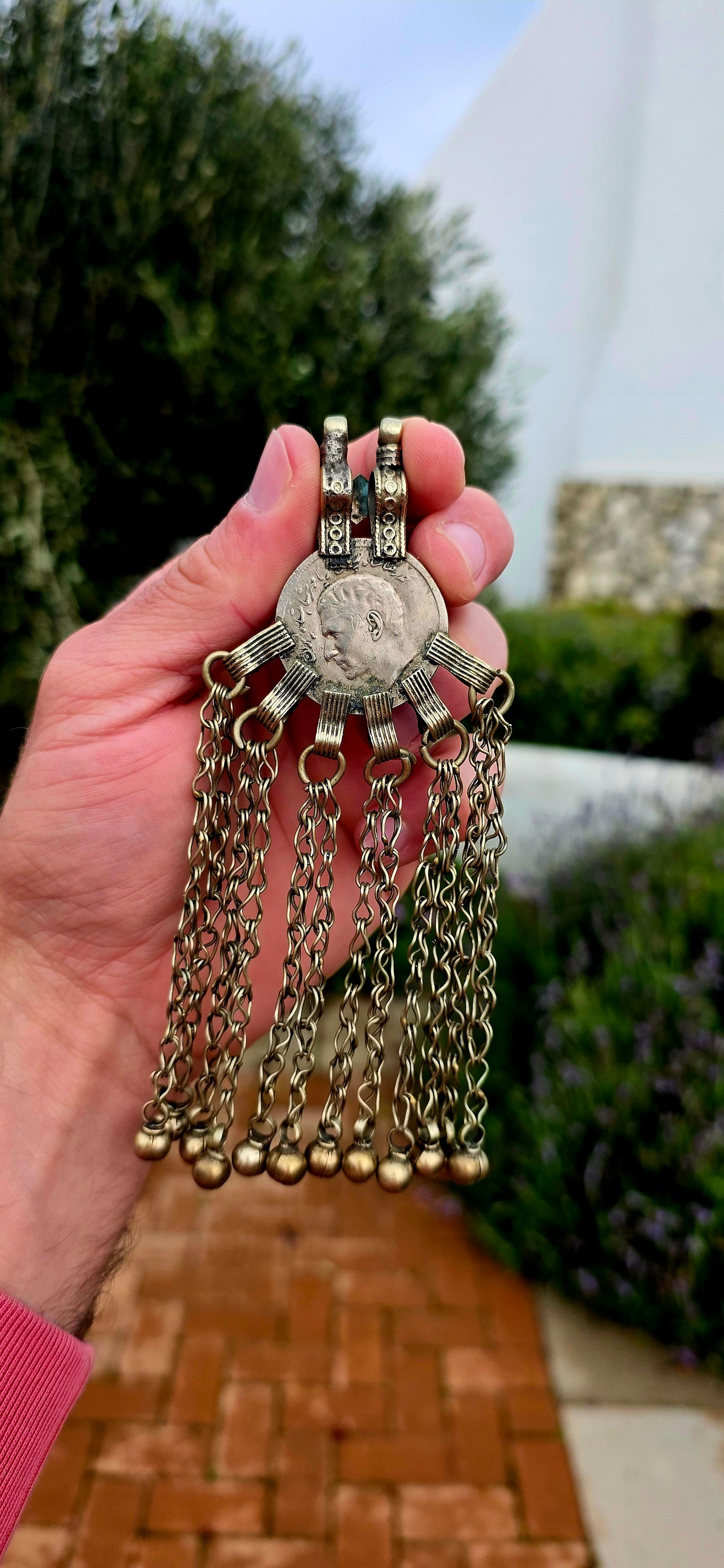 Bold, beautifully expressive, and steeped in nomadic tradition... this large vintage Afghan Kuchi tribal pendant is a striking statement piece that celebrates the rich artistry of Central Asia.