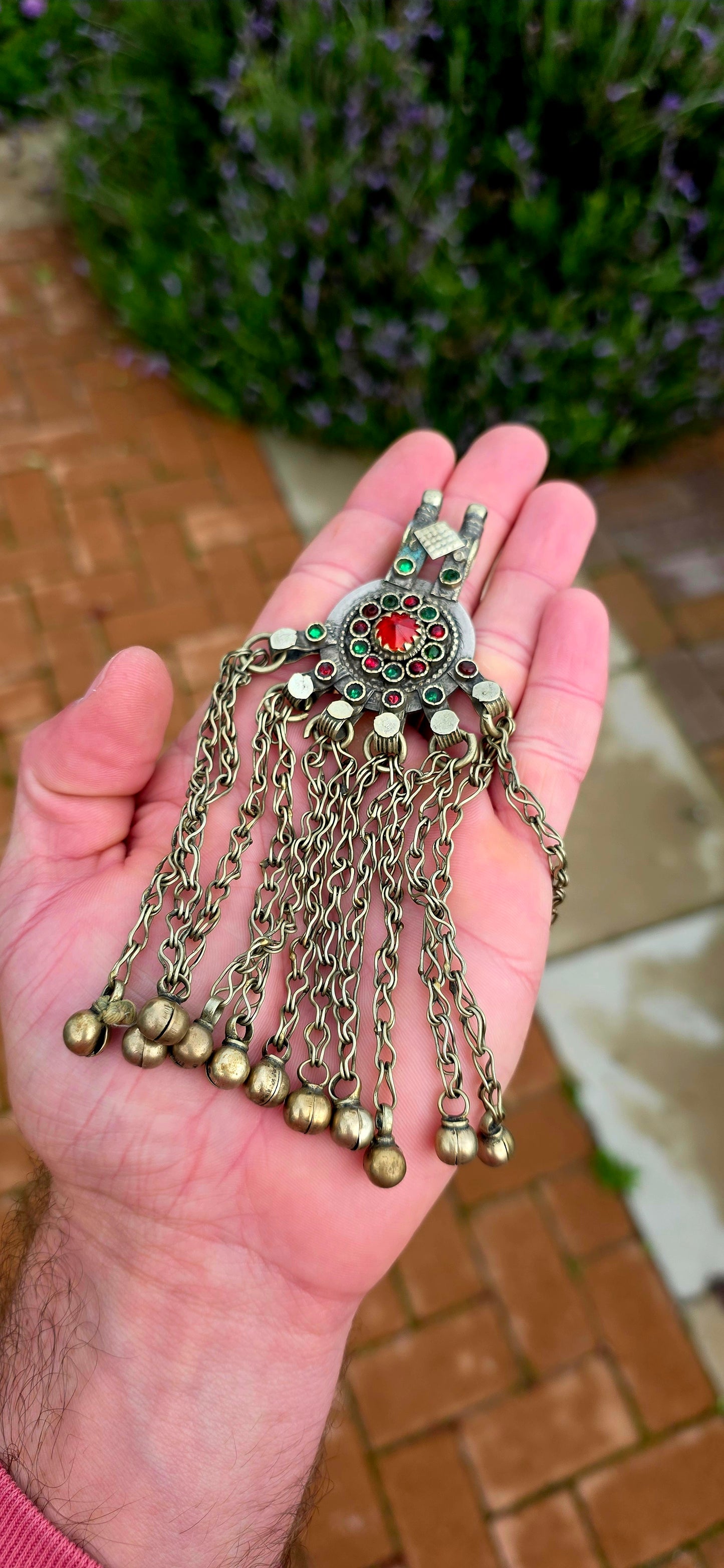 Bold, beautifully expressive, and steeped in nomadic tradition... this large vintage Afghan Kuchi tribal pendant is a striking statement piece that celebrates the rich artistry of Central Asia.