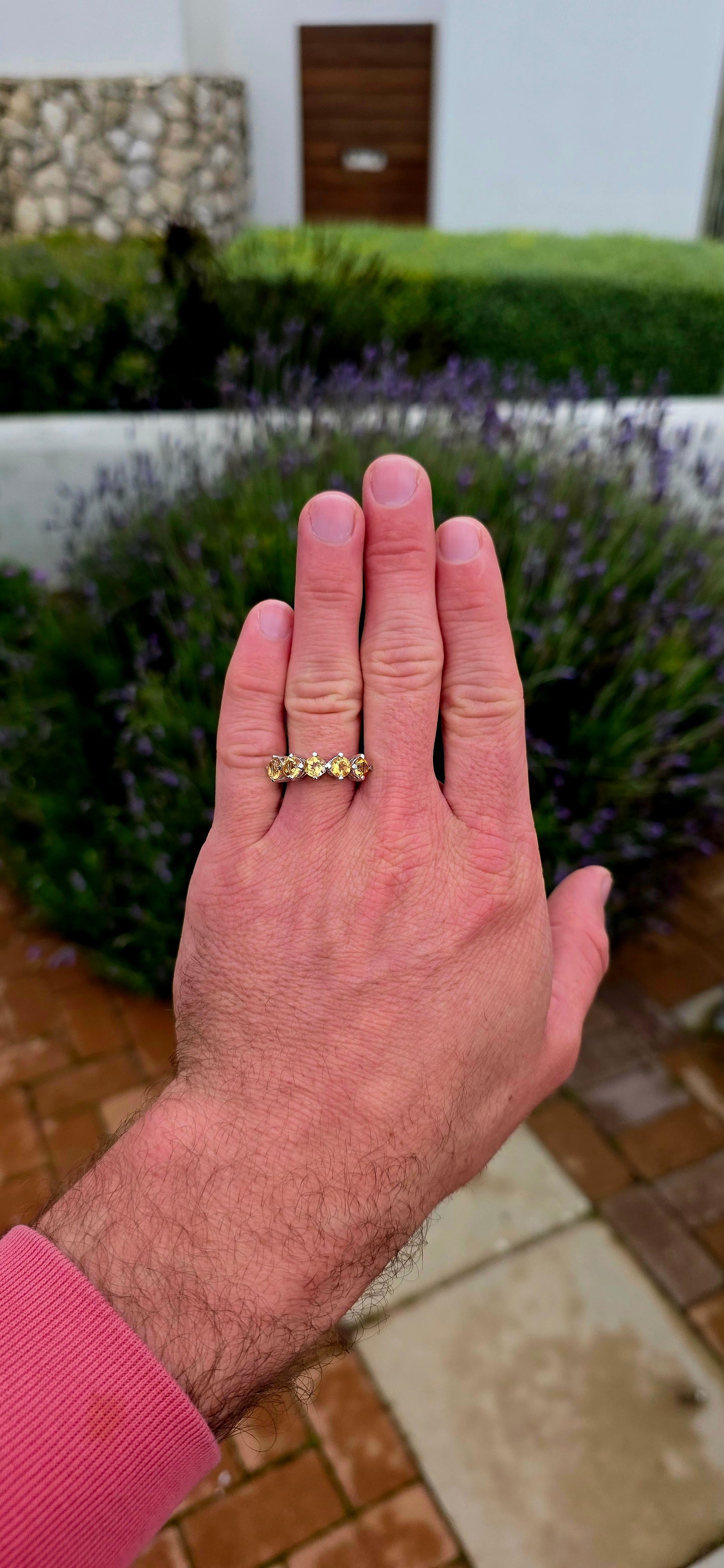 Bright, elegant and wonderfully easy to wear... this beautiful sterling silver half eternity ring features a glowing row of five natural citrine gemstones, bringing the most gorgeous little burst of golden sunshine to the finger.