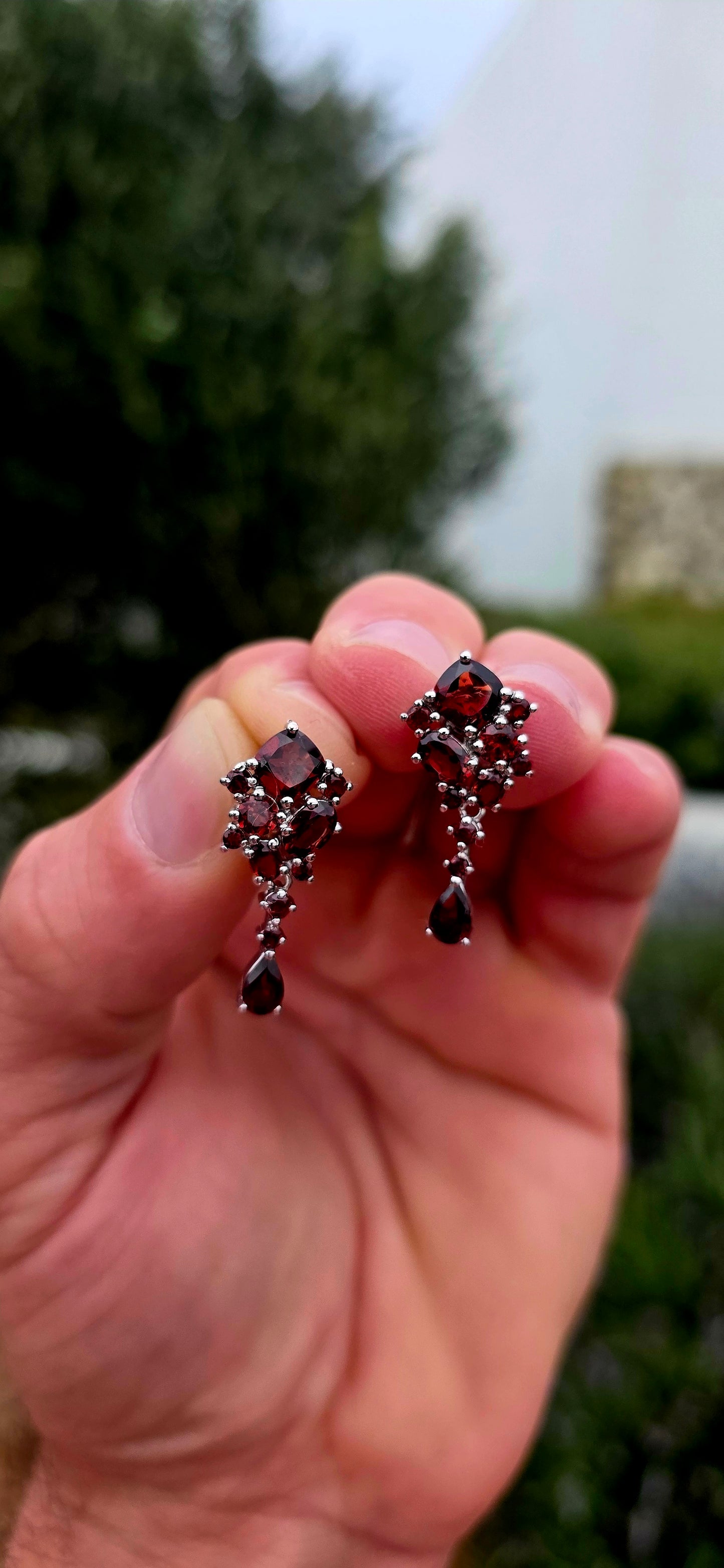 Rich, romantic and wonderfully dramatic... these beautiful sterling silver garnet drop earrings are absolutely drenched in those deep wine-red tones that make garnets so irresistible.