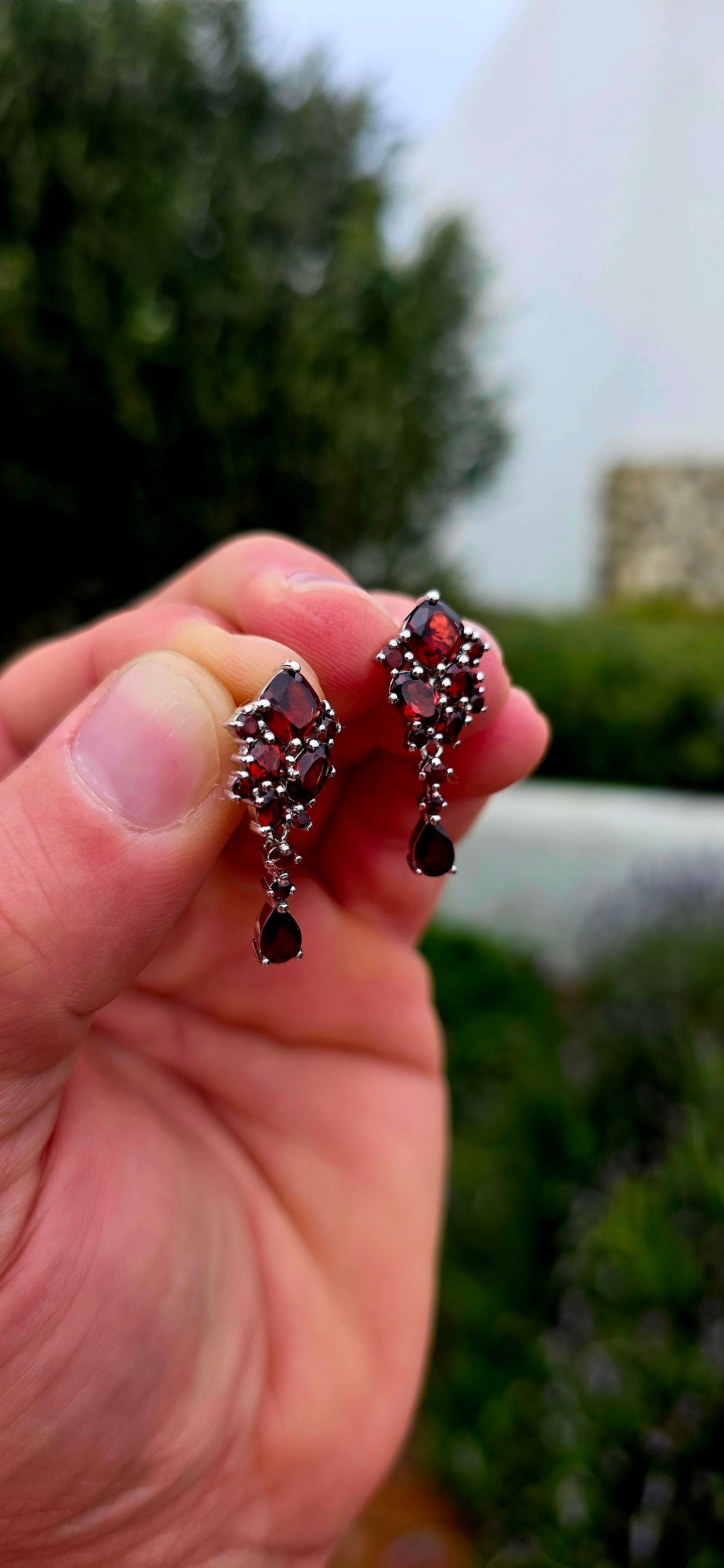 Rich, romantic and wonderfully dramatic... these beautiful sterling silver garnet drop earrings are absolutely drenched in those deep wine-red tones that make garnets so irresistible.