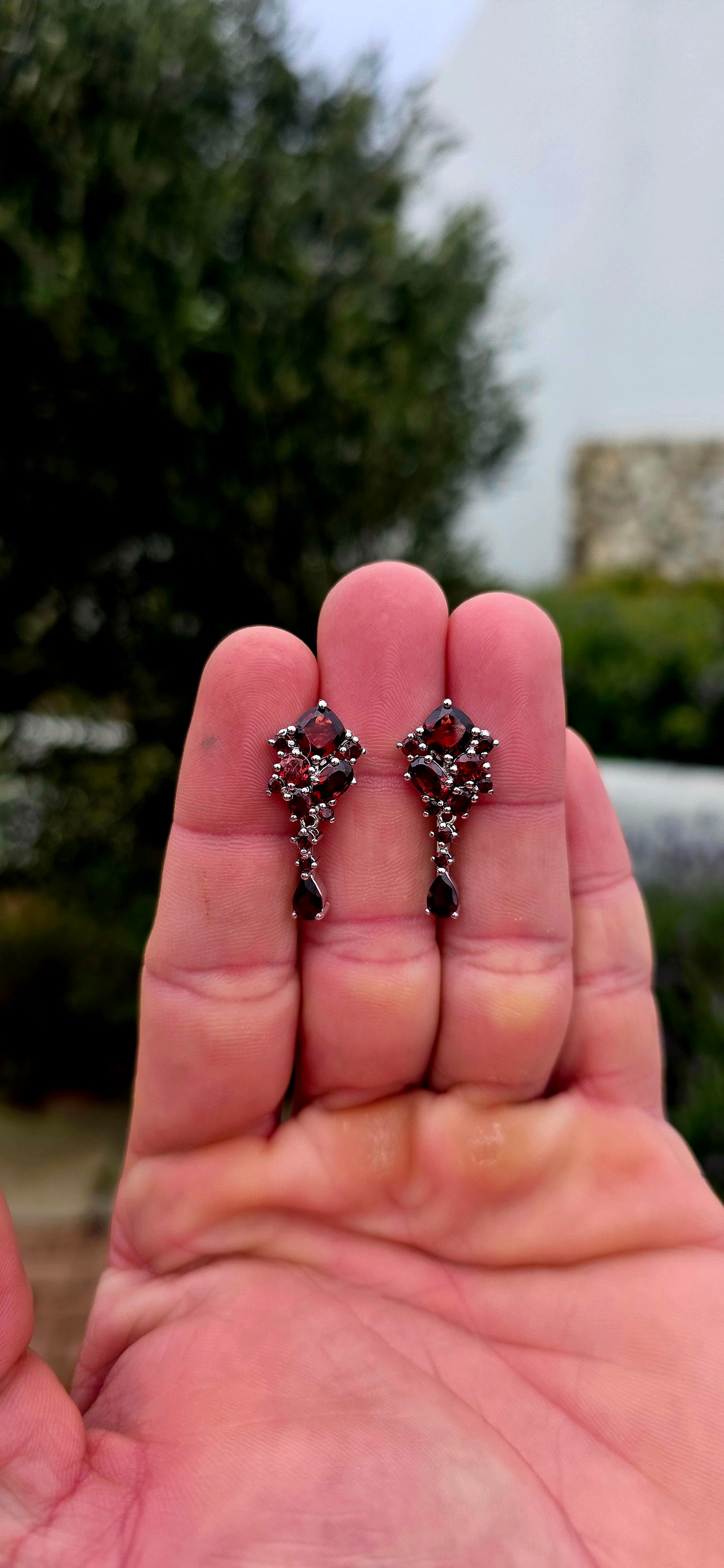 Rich, romantic and wonderfully dramatic... these beautiful sterling silver garnet drop earrings are absolutely drenched in those deep wine-red tones that make garnets so irresistible.