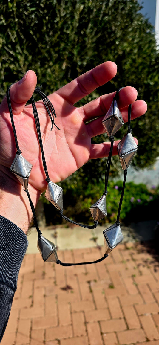 Okay… THIS is seriously cool!!  One of those pieces that looks like it could have walked straight out of a high-end contemporary designer collection, yet its beauty comes from traditional Hill Tribe silversmithing.