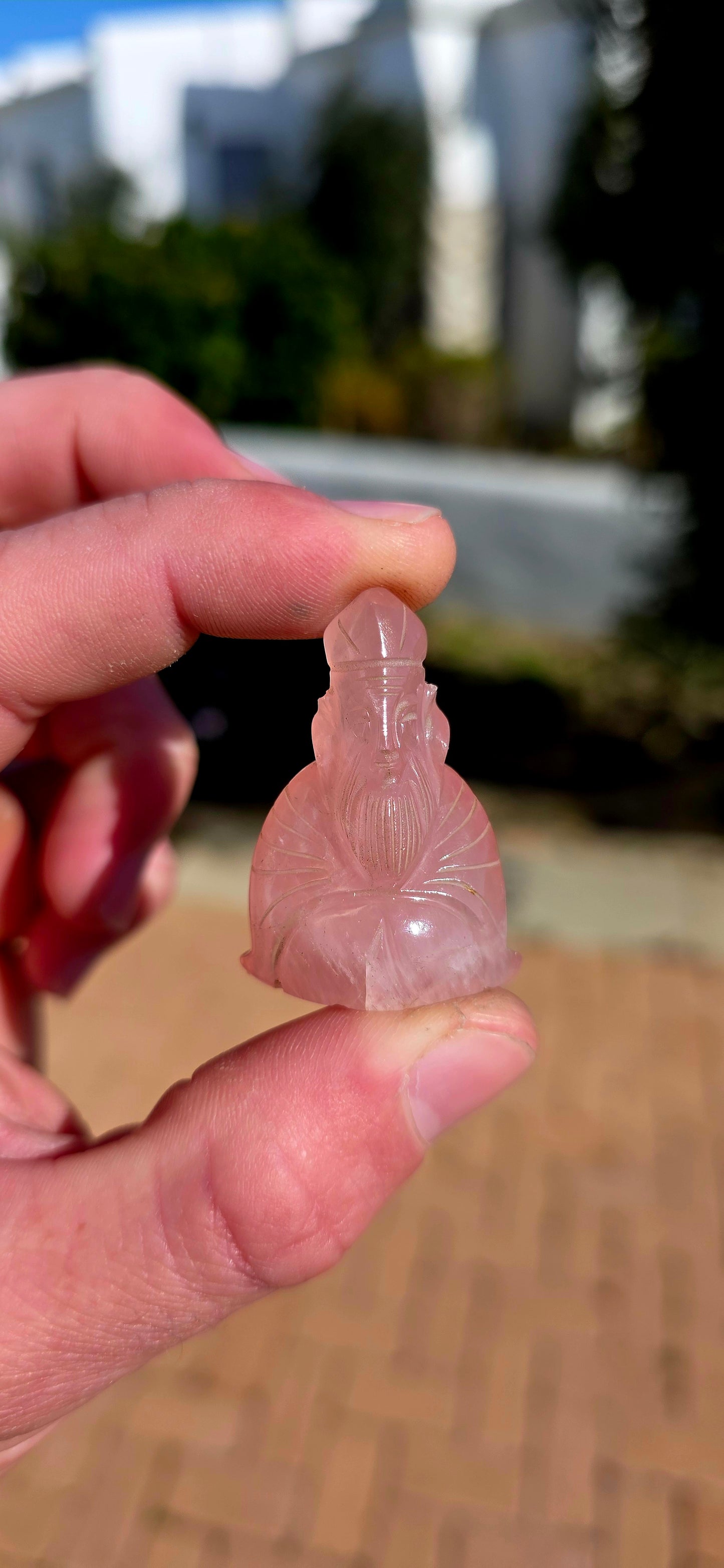 A wonderfully colourful vintage collection of seven miniature Chinese-deity and auspicious figure carvings, each individually hand-carved from a different natural gemstone.