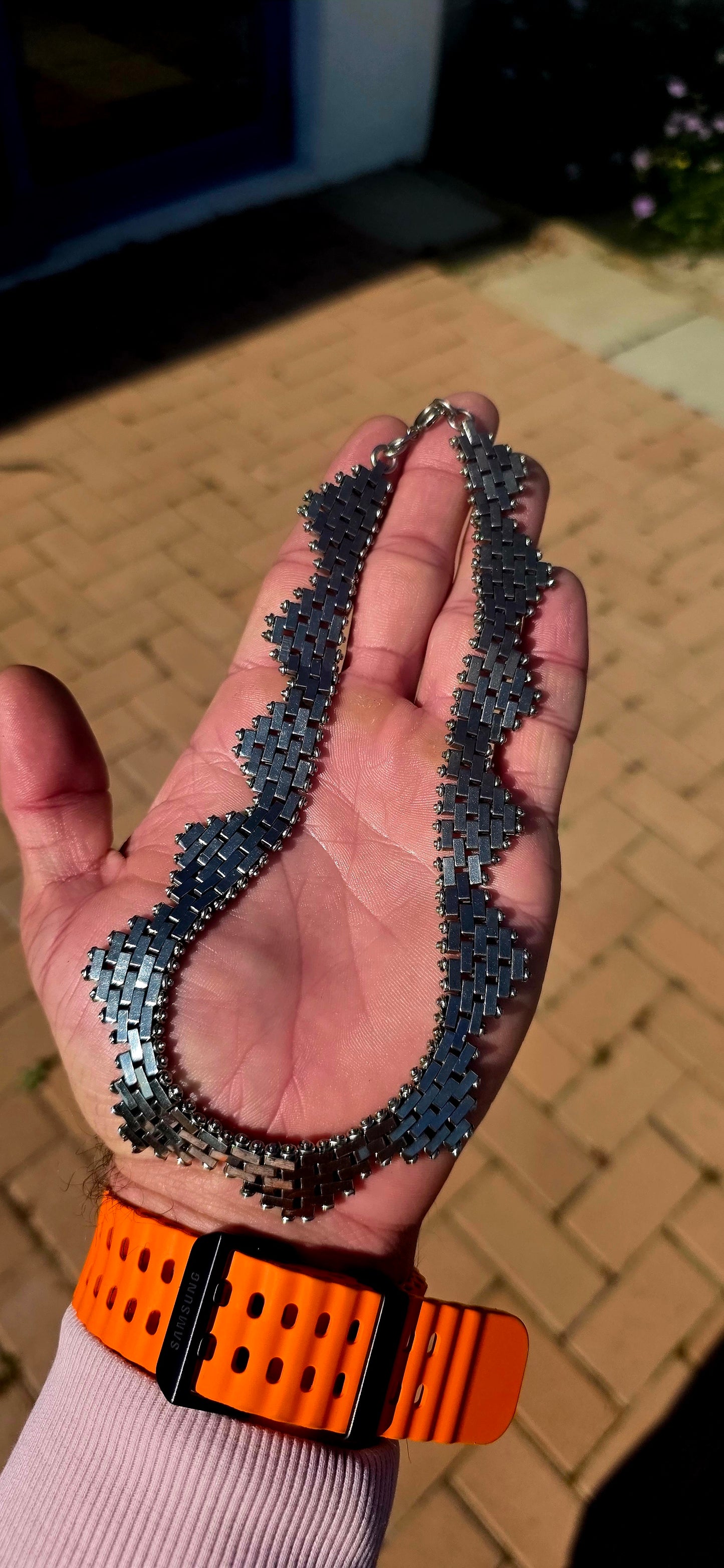 What a fabulous statement piece! This beautiful Victorian Revival bookchain collar necklace takes its inspiration from the wonderfully elaborate bookchain jewellery that became fashionable during the Victorian era.