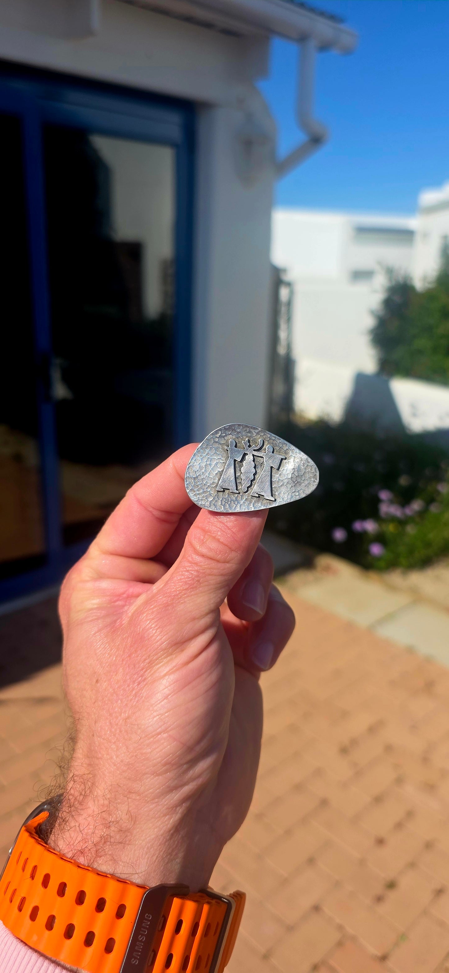 A wonderfully characterful vintage handmade Israeli sterling silver brooch, featuring an organic asymmetrical form with a beautifully hand-hammered textured surface.