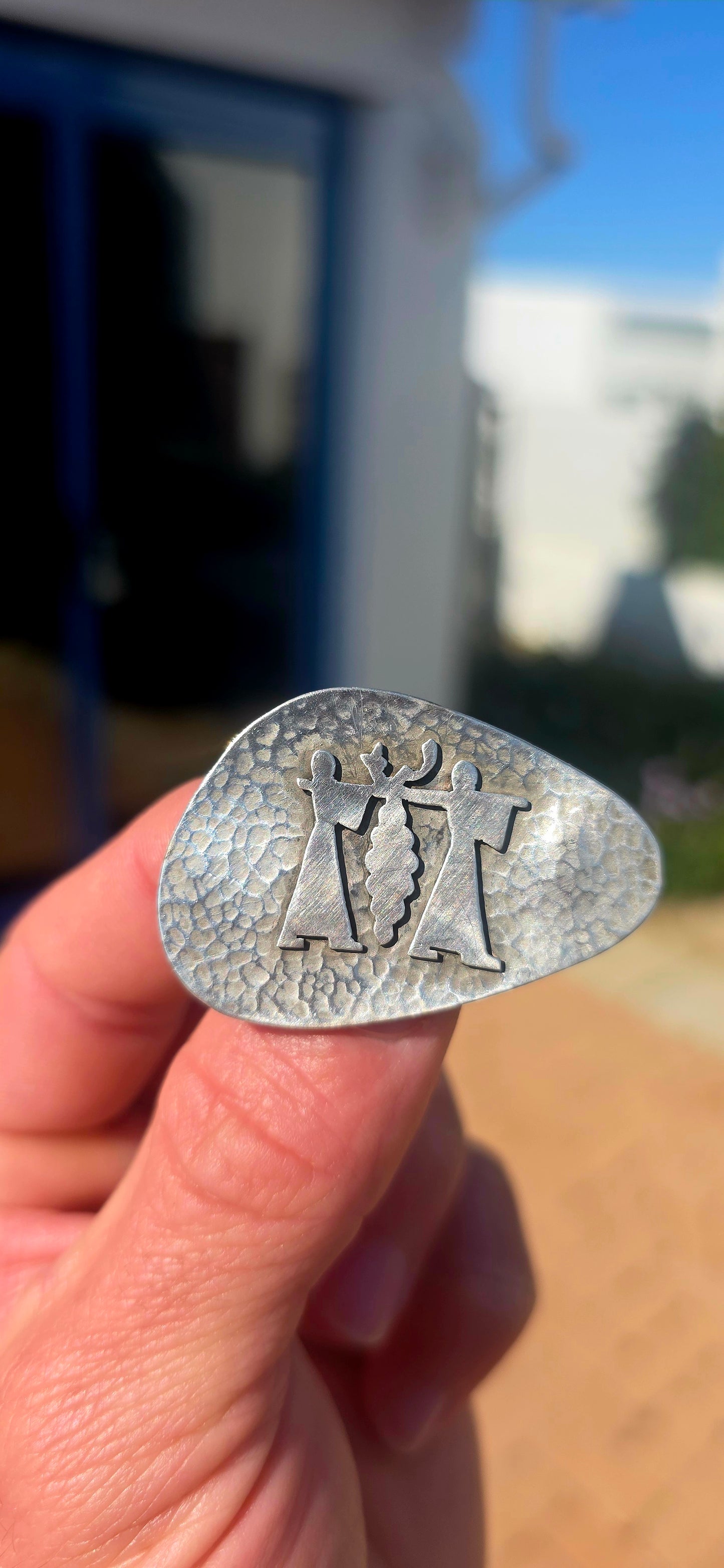 A wonderfully characterful vintage handmade Israeli sterling silver brooch, featuring an organic asymmetrical form with a beautifully hand-hammered textured surface.