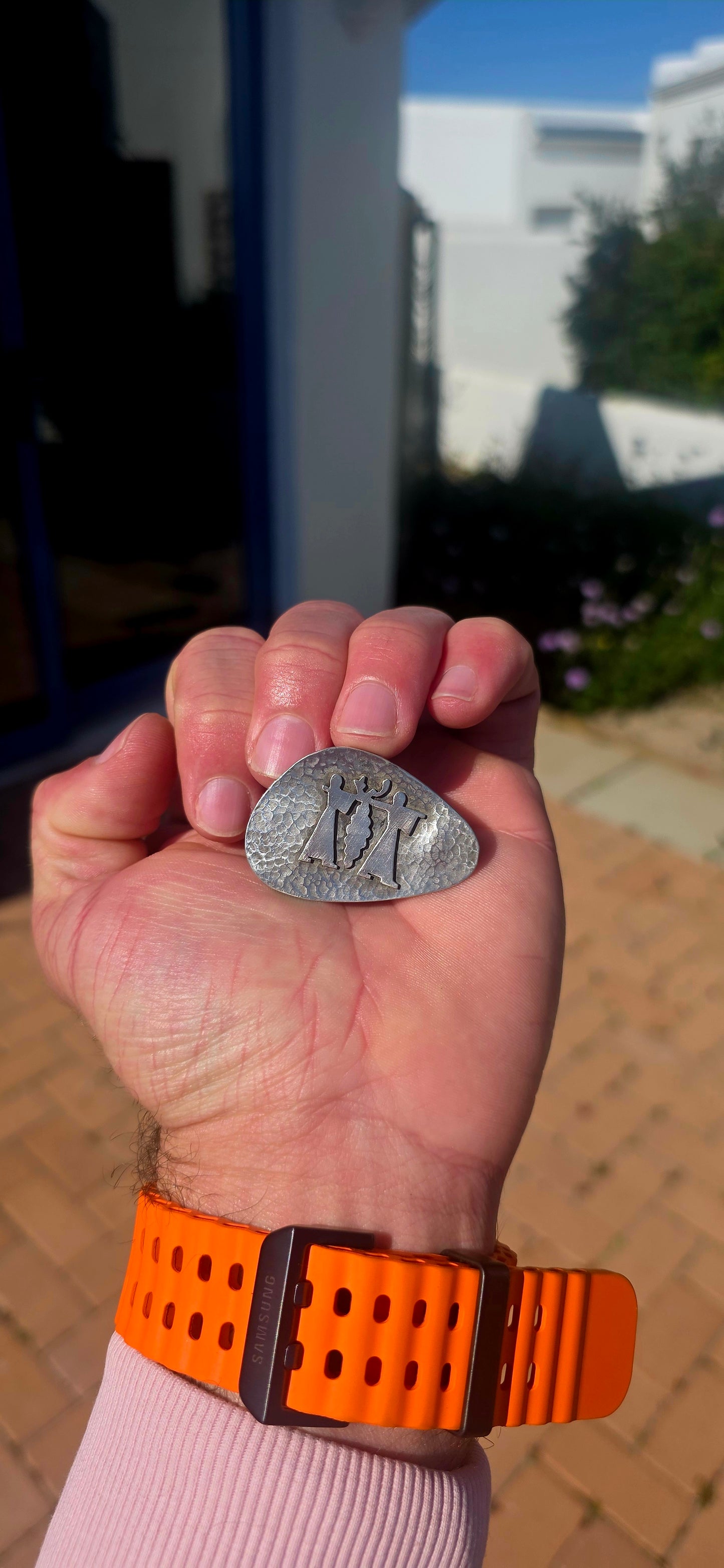 A wonderfully characterful vintage handmade Israeli sterling silver brooch, featuring an organic asymmetrical form with a beautifully hand-hammered textured surface.