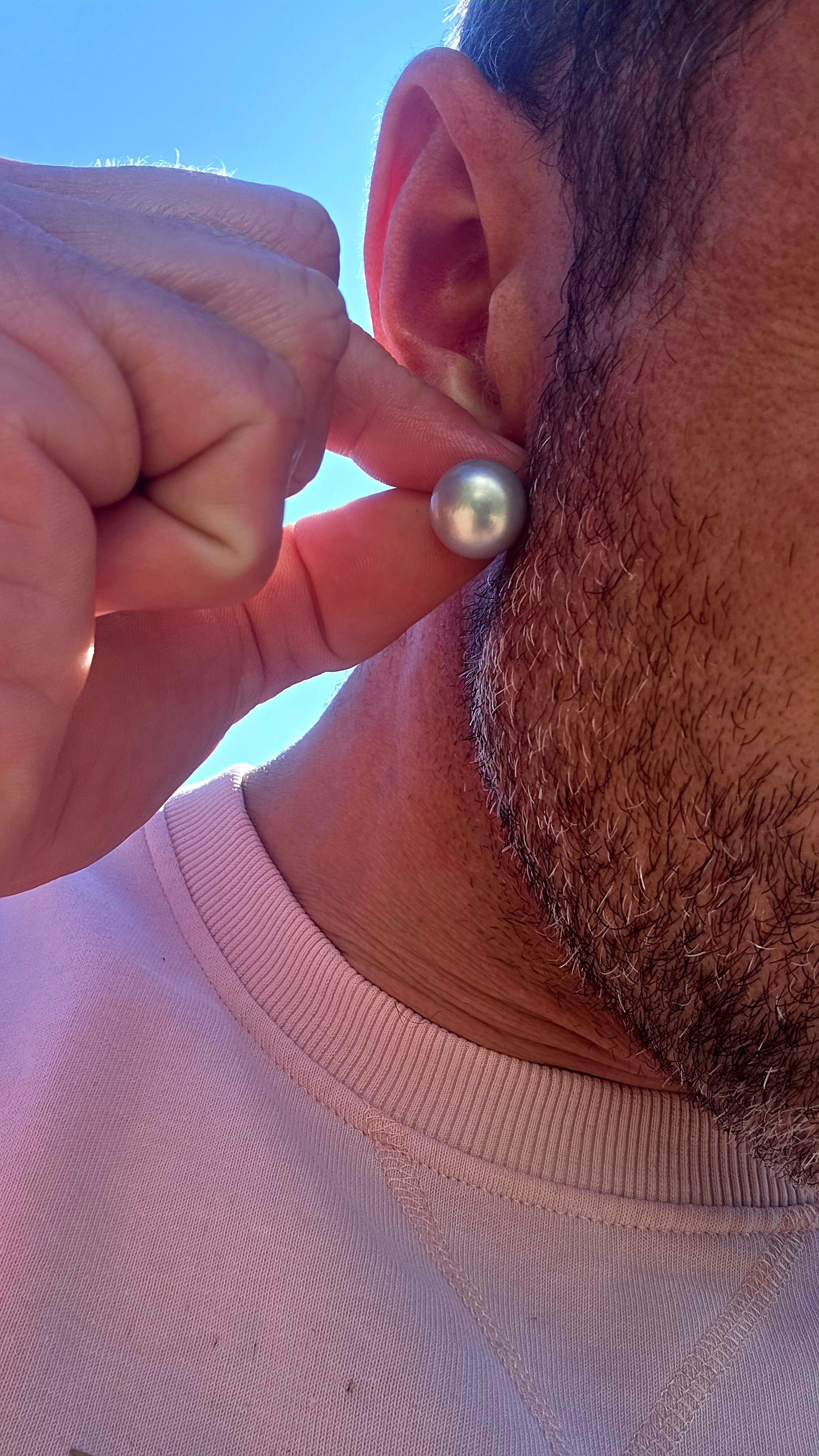Beautifully classic with a wonderfully modern edge… this generously sized pair of freshwater button pearl stud earrings features gorgeous smoky silvery-grey pearls with a soft natural lustre and subtle flashes of blue-grey as they catch the light.