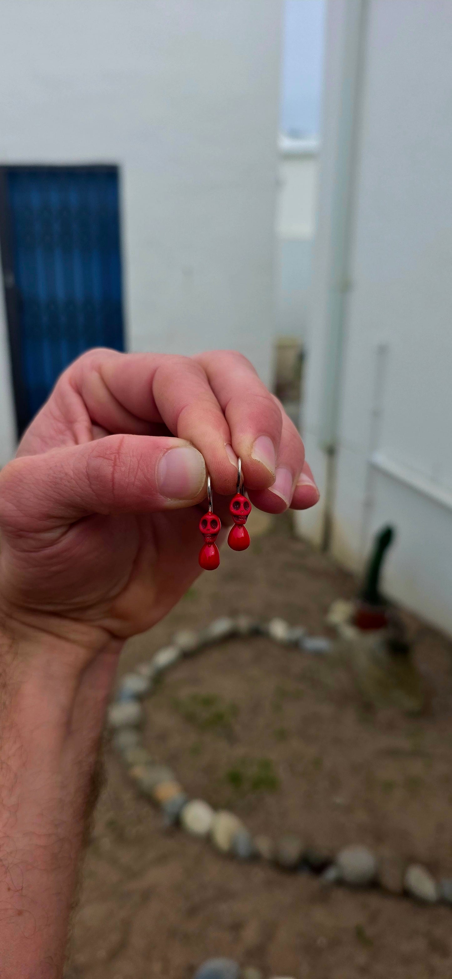 How fabulously quirky are these!! A wonderfully playful pair of contemporary South African designer earrings by Geraldine Fenn, combining a little macabre humour with a gorgeous pop of bright red.
