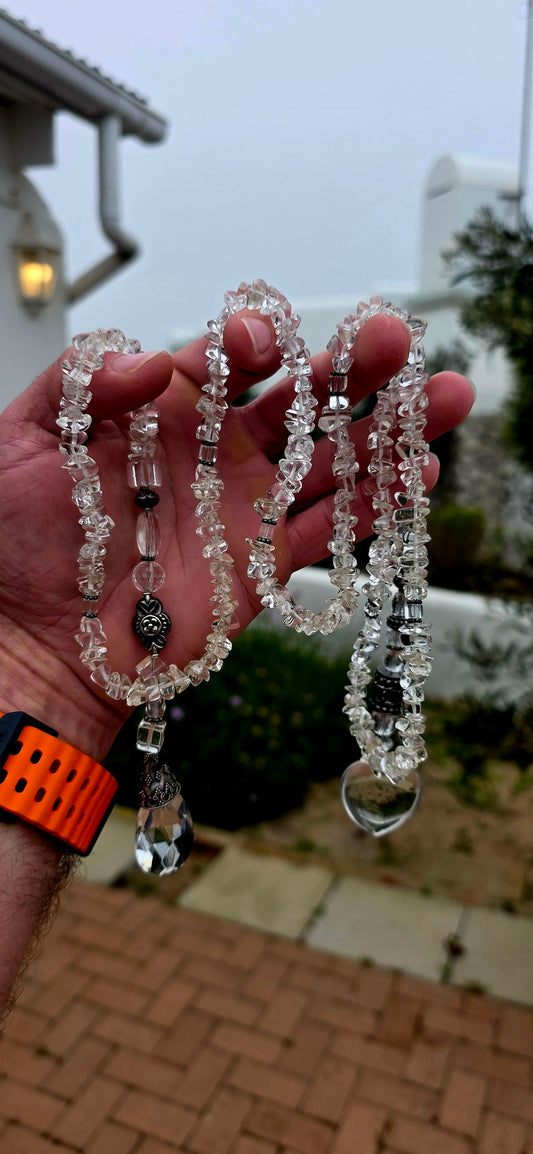 A wonderfully bohemian artisan-made extra-long wrap / knot necklace, created from hundreds of natural clear quartz gemstone chips, interspersed with an eclectic collection of beautifully detailed sterling silver decorative beads.