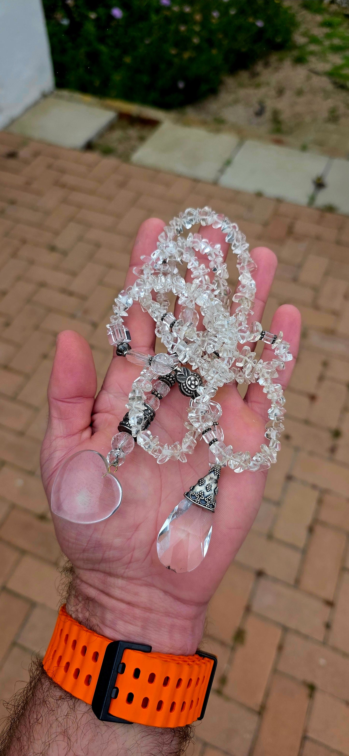 A wonderfully bohemian artisan-made extra-long wrap / knot necklace, created from hundreds of natural clear quartz gemstone chips, interspersed with an eclectic collection of beautifully detailed sterling silver decorative beads.