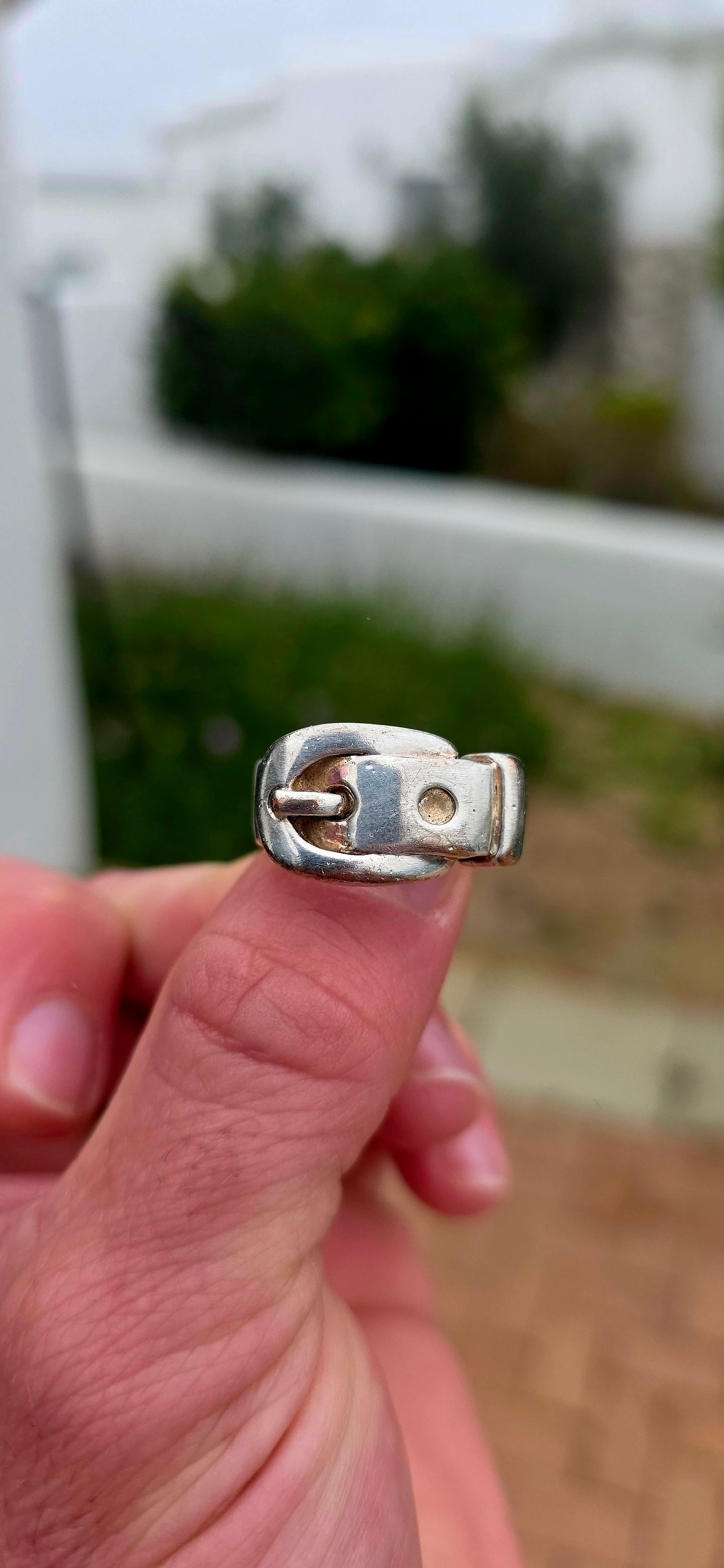 Such a fabulous chunky one! A vintage unisex costume ring, crafted in silver-plated metal and designed as a wonderfully bold Victorian Revival belt & buckle ring.