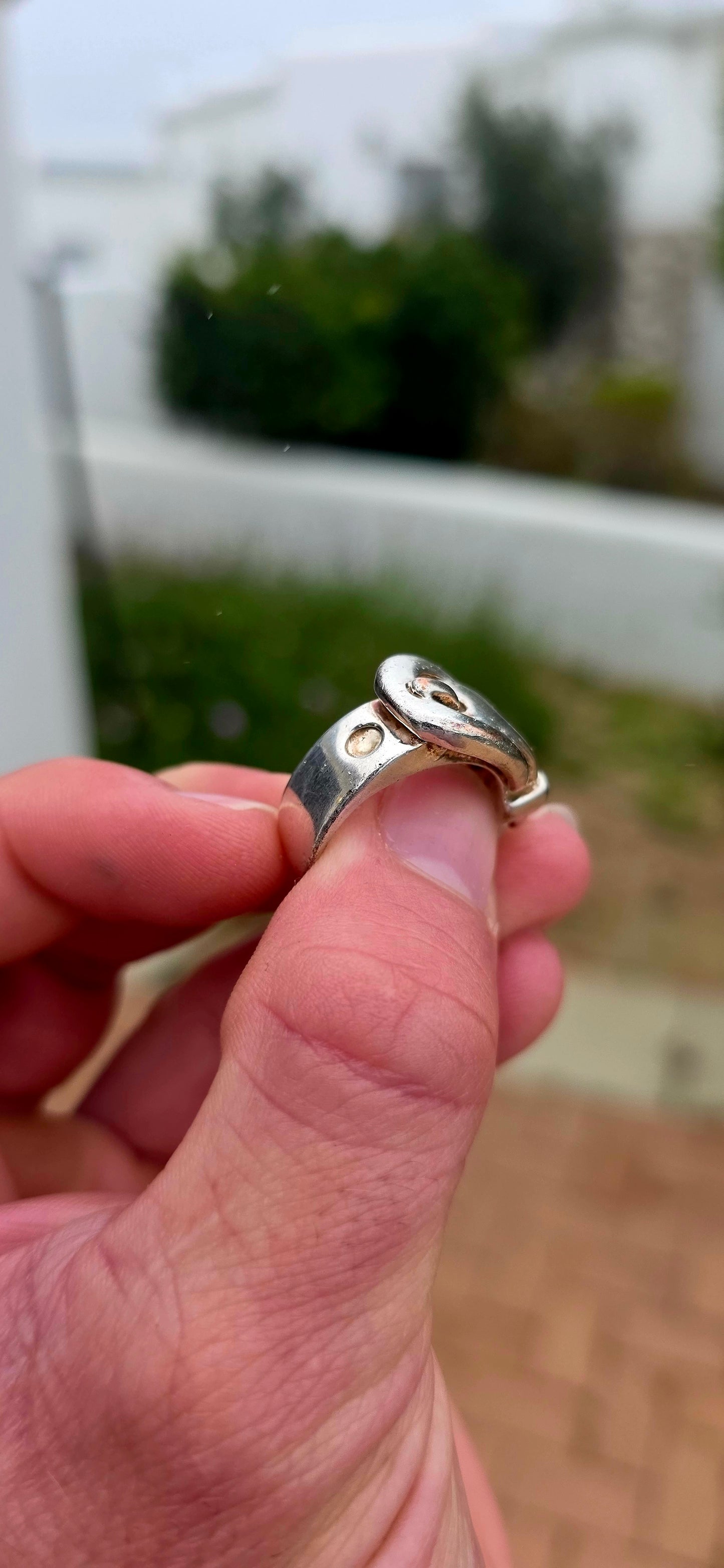 Such a fabulous chunky one! A vintage unisex costume ring, crafted in silver-plated metal and designed as a wonderfully bold Victorian Revival belt & buckle ring.