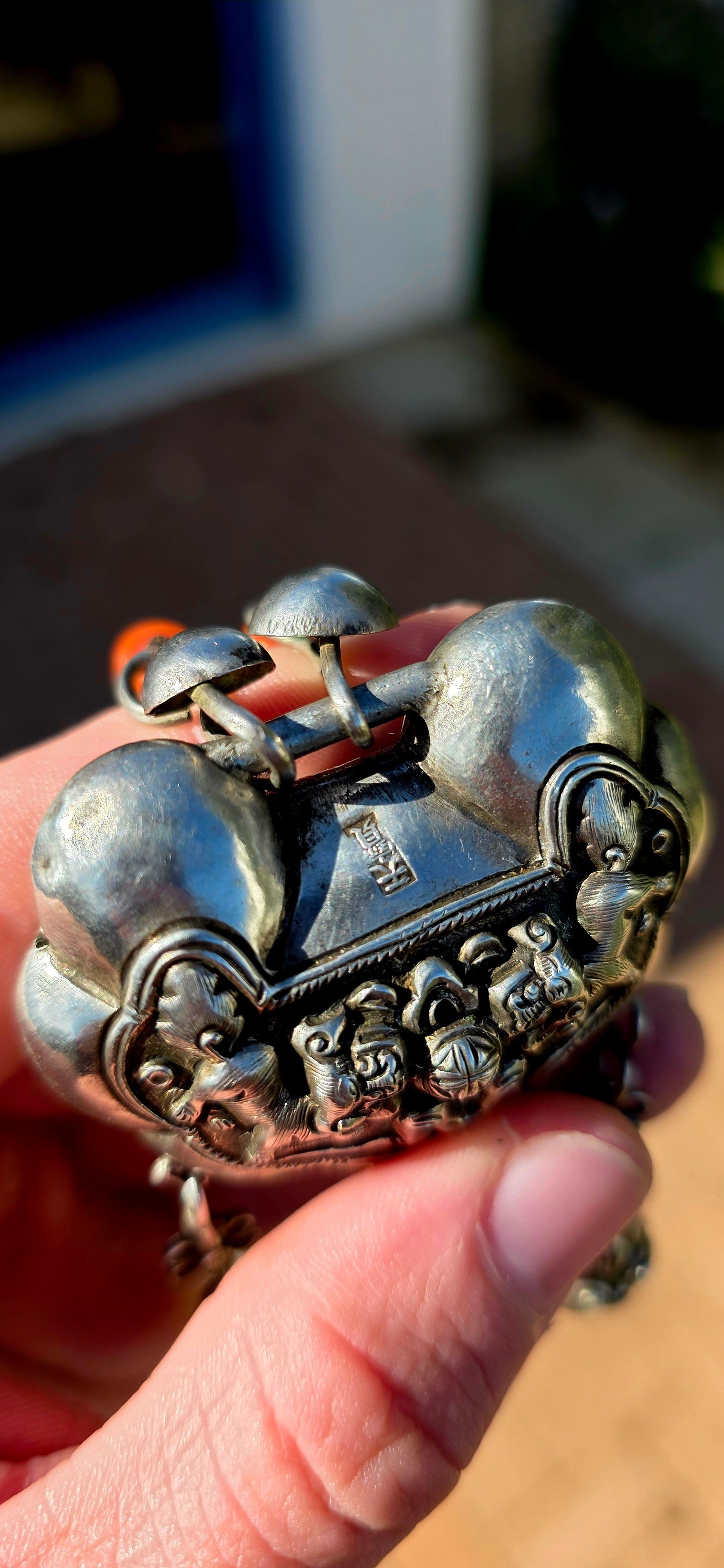 An absolutely extraordinary antique Chinese Qing Dynasty / early 20th-century sterling silver “Longevity Lock” necklace, richly decorated with traditional auspicious imagery and strung with vibrant coral and turquoise gemstone beads.