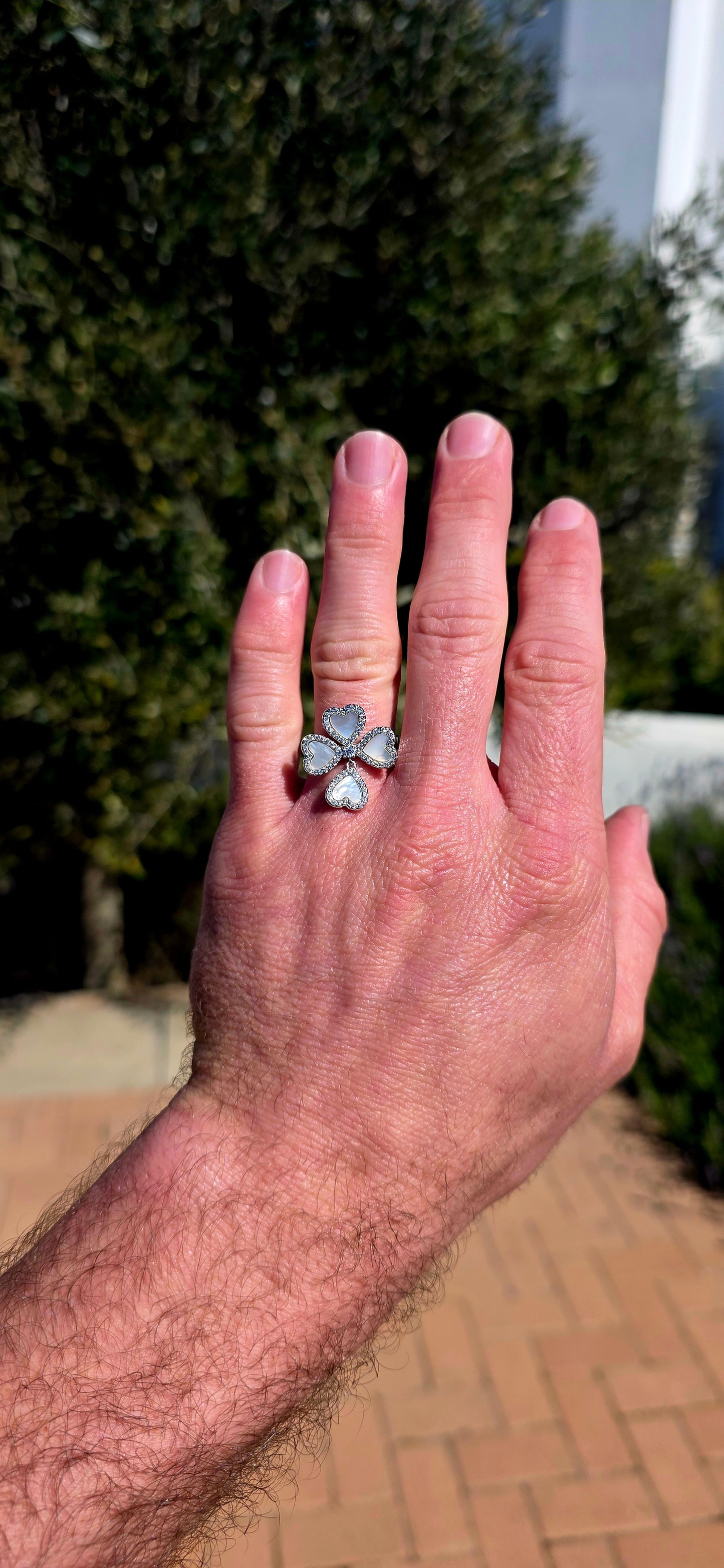 Playful, feminine and just a little bit whimsical! This gorgeous sterling silver ring takes the classic lucky four-leaf clover and gives it a beautifully romantic twist.