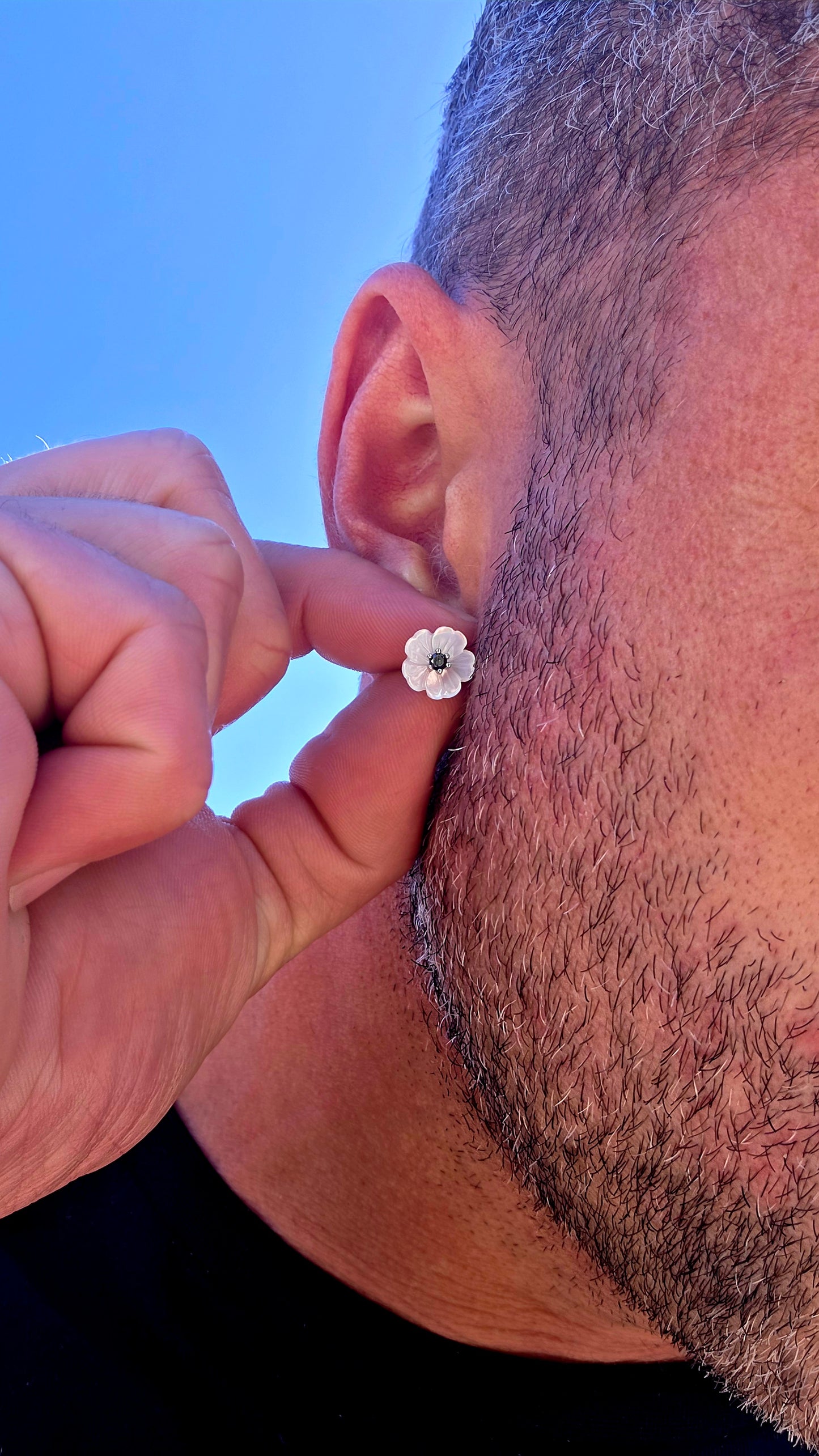 Magical little beauties!! These gorgeous sterling silver flower stud earrings feature delicate blossoms individually carved from luminous mother-of-pearl, giving each petal beautiful natural iridescence and a wonderfully dimensional finish.