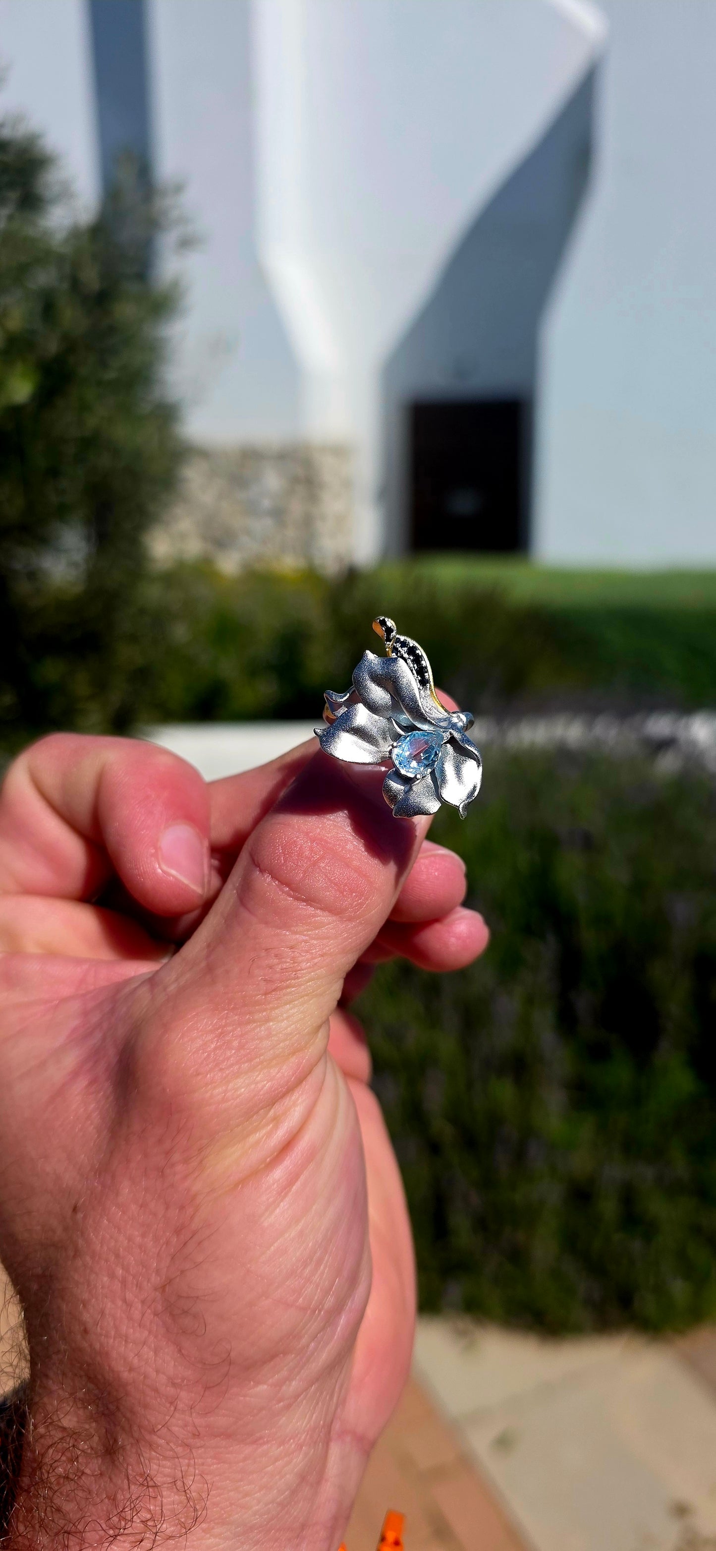 A ring fit for a Forest Queen!  This extraordinary artisan-made statement ring is crafted in sterling silver, sculpted into a wonderfully organic wildflower that appears almost as though it has just unfurled across the finger.