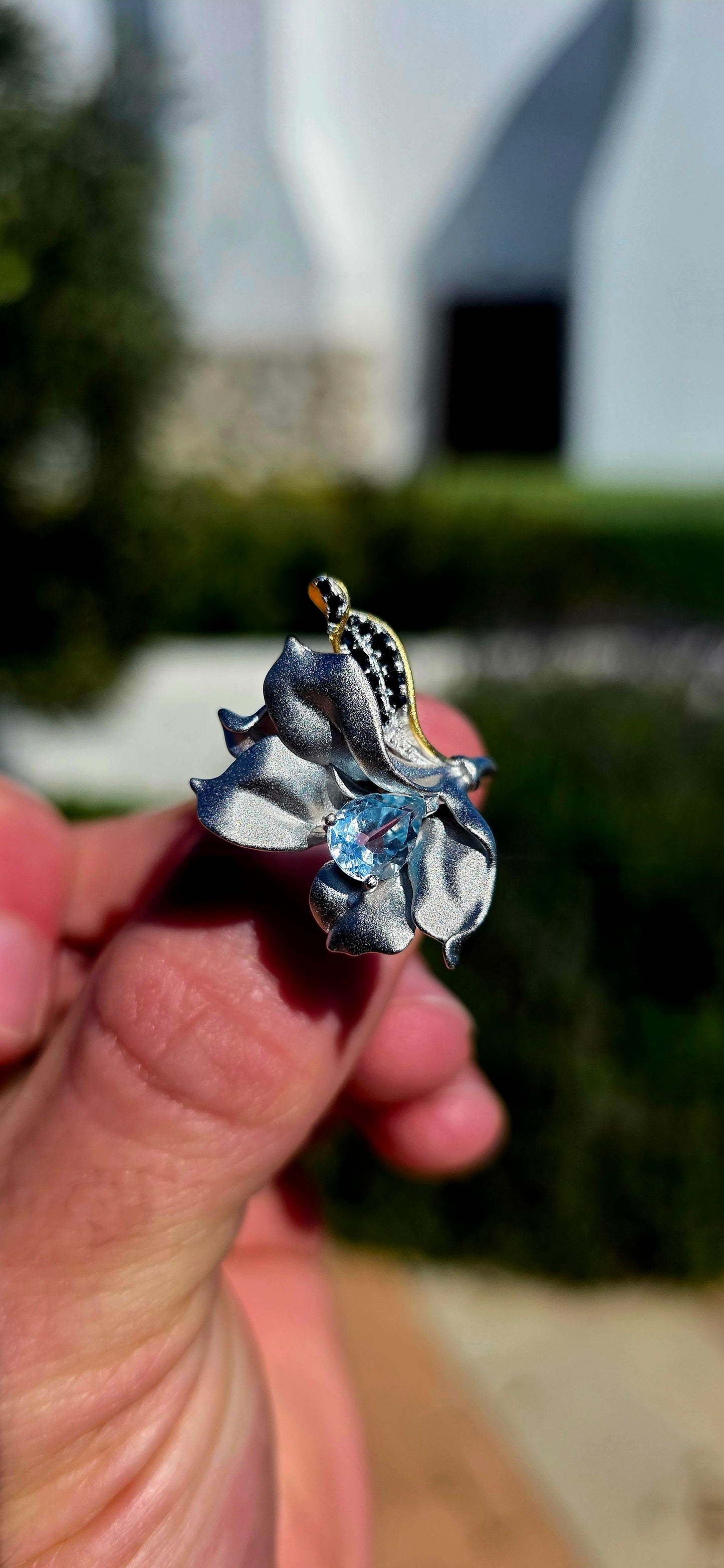 A ring fit for a Forest Queen!  This extraordinary artisan-made statement ring is crafted in sterling silver, sculpted into a wonderfully organic wildflower that appears almost as though it has just unfurled across the finger.
