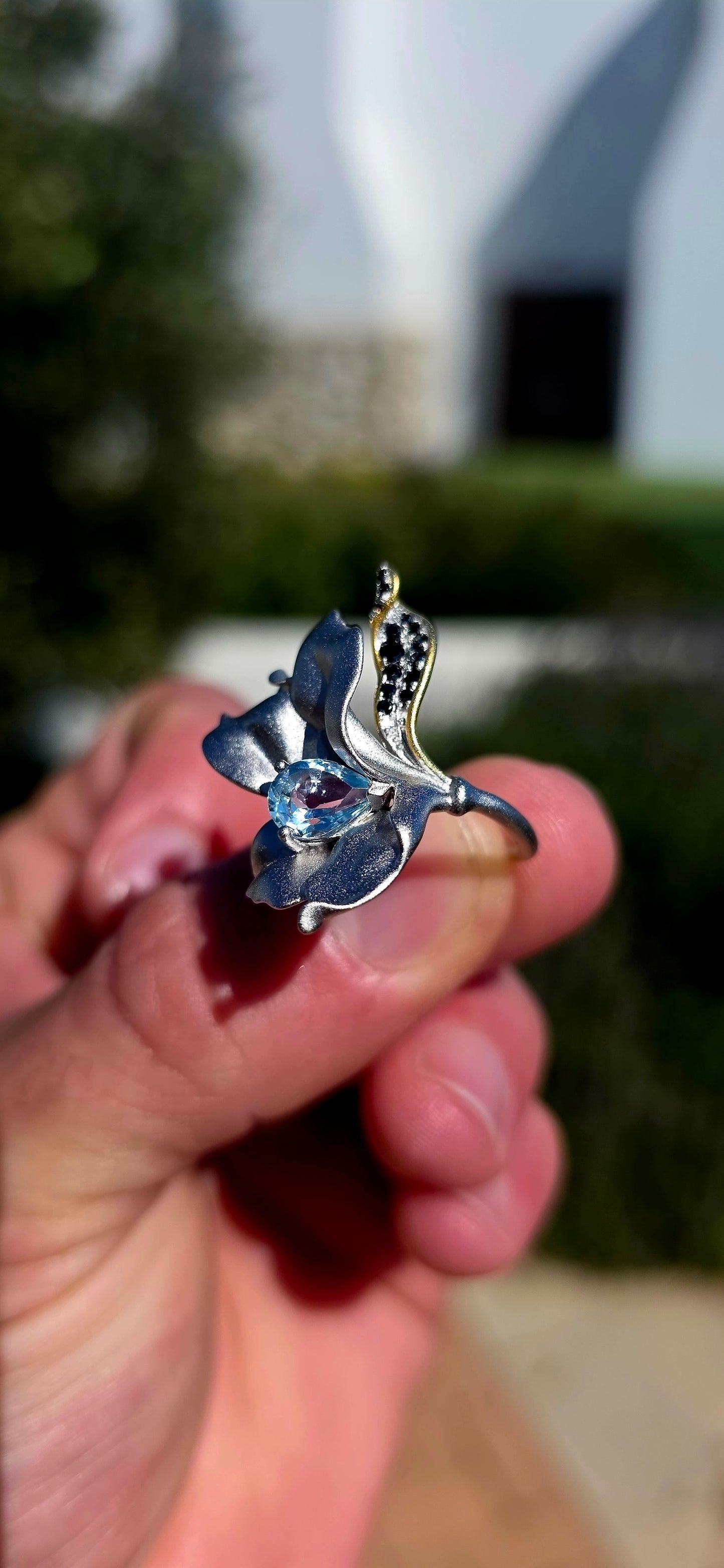 A ring fit for a Forest Queen!  This extraordinary artisan-made statement ring is crafted in sterling silver, sculpted into a wonderfully organic wildflower that appears almost as though it has just unfurled across the finger.