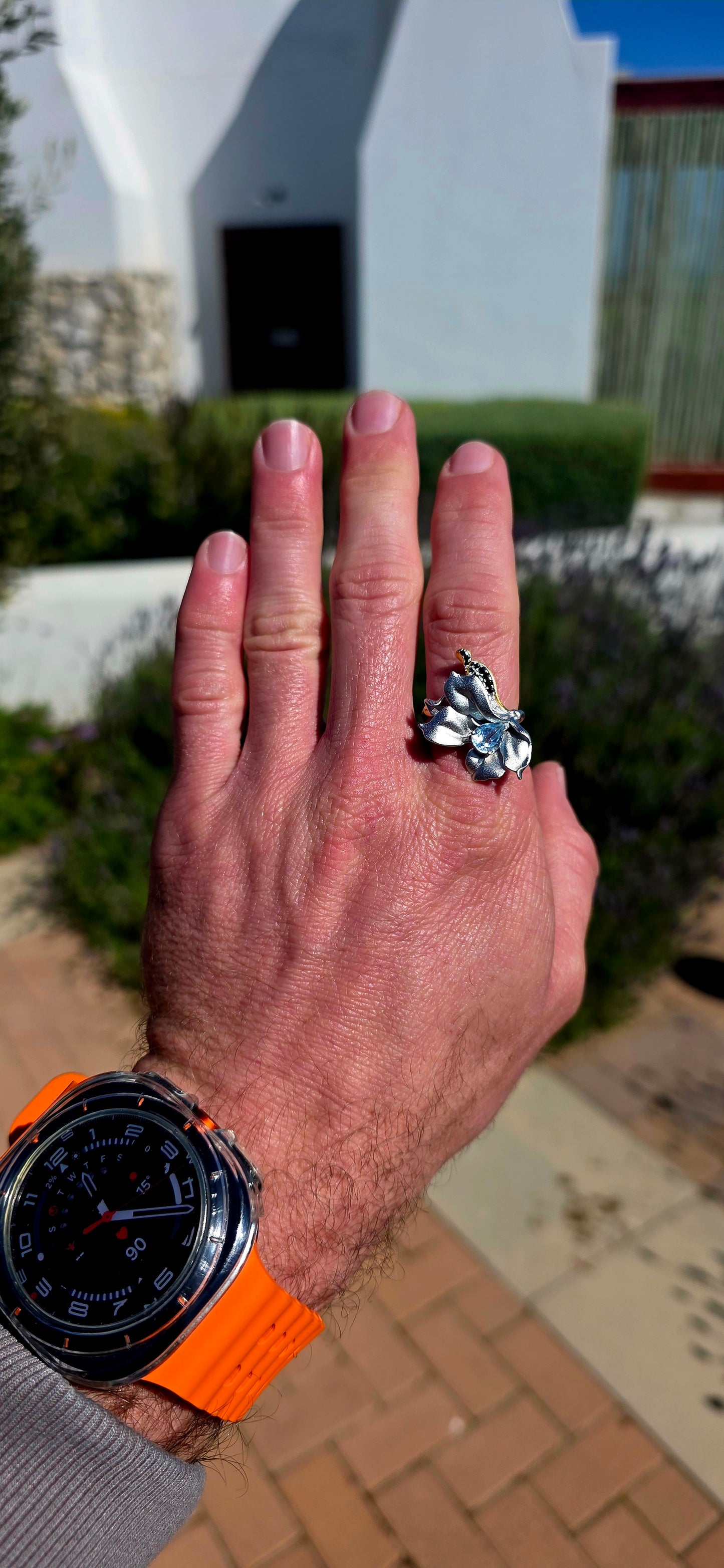 A ring fit for a Forest Queen!  This extraordinary artisan-made statement ring is crafted in sterling silver, sculpted into a wonderfully organic wildflower that appears almost as though it has just unfurled across the finger.