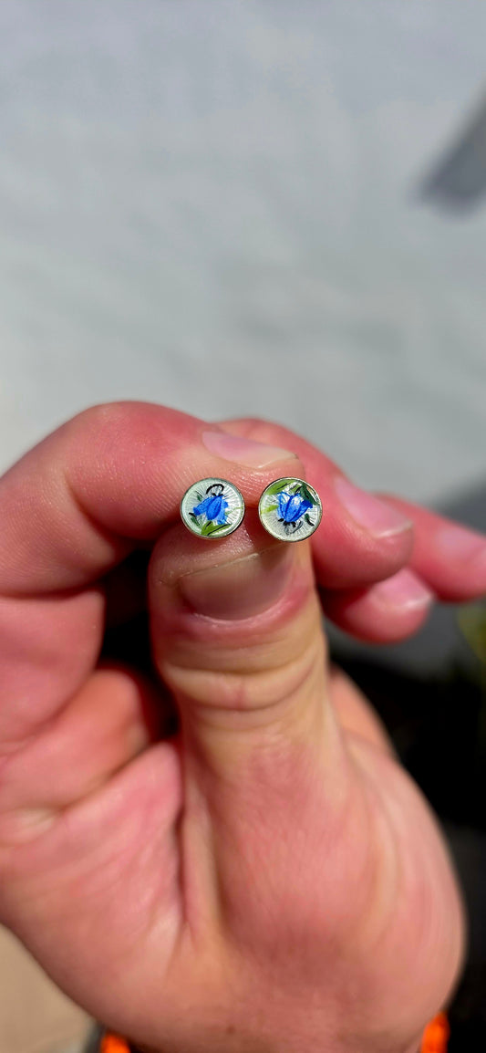 Absolutely charming! A petite pair of vintage goldtone stud earrings, each decorated with a beautifully delicate bluebell flower motif in vivid blue and fresh green enamel.