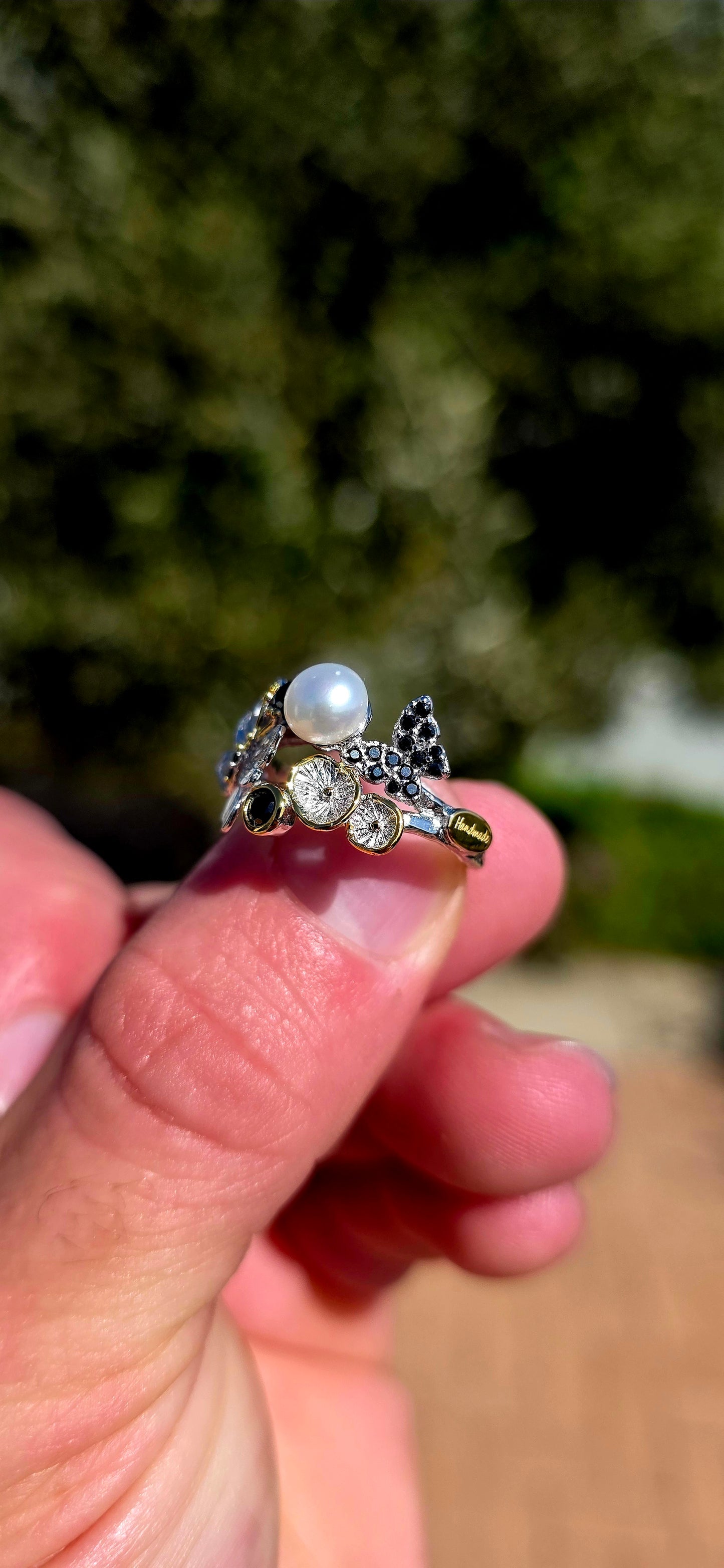 Straight from a magical woodland! This wonderfully whimsical statement ring is crafted in solid sterling silver, with the band beautifully formed to resemble twisting tree branches and twigs.
