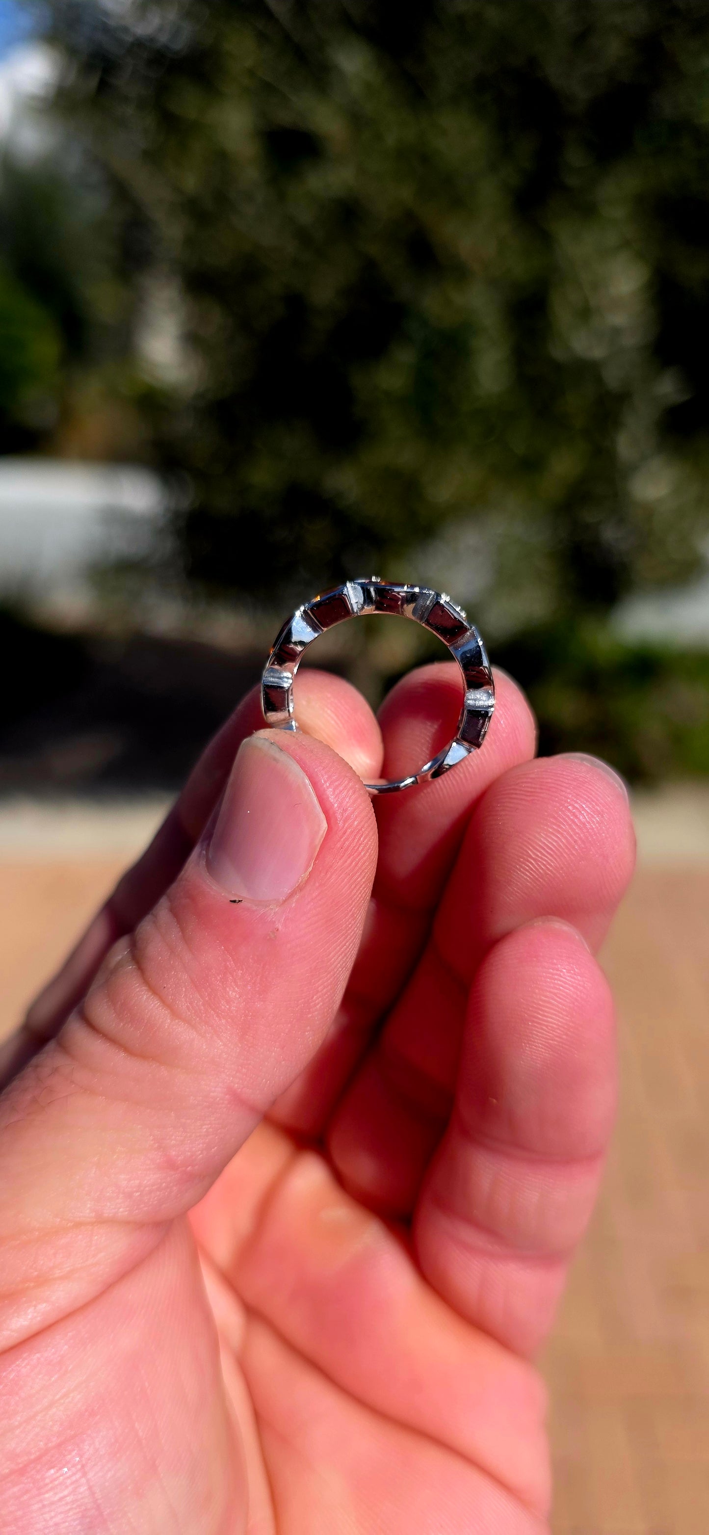 What a fabulous burst of sunshine! This beautiful sterling silver half-eternity ring is tube-set with alternating citrine gemstones, combining princess and marquise cuts in gorgeous shades of golden yellow, honey and deep burnt orange.