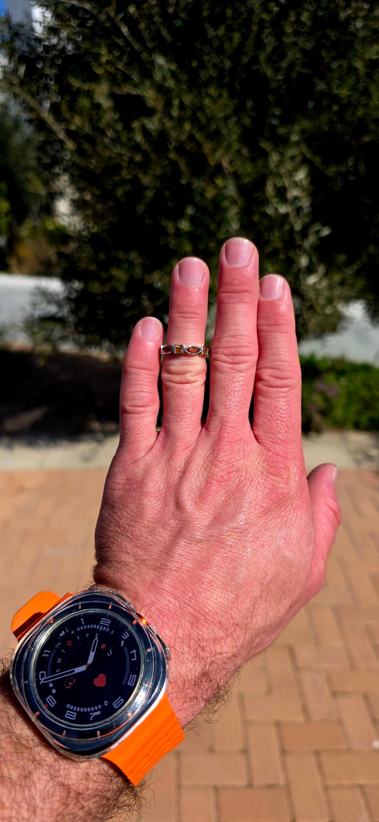 What a fabulous burst of sunshine! This beautiful sterling silver half-eternity ring is tube-set with alternating citrine gemstones, combining princess and marquise cuts in gorgeous shades of golden yellow, honey and deep burnt orange.
