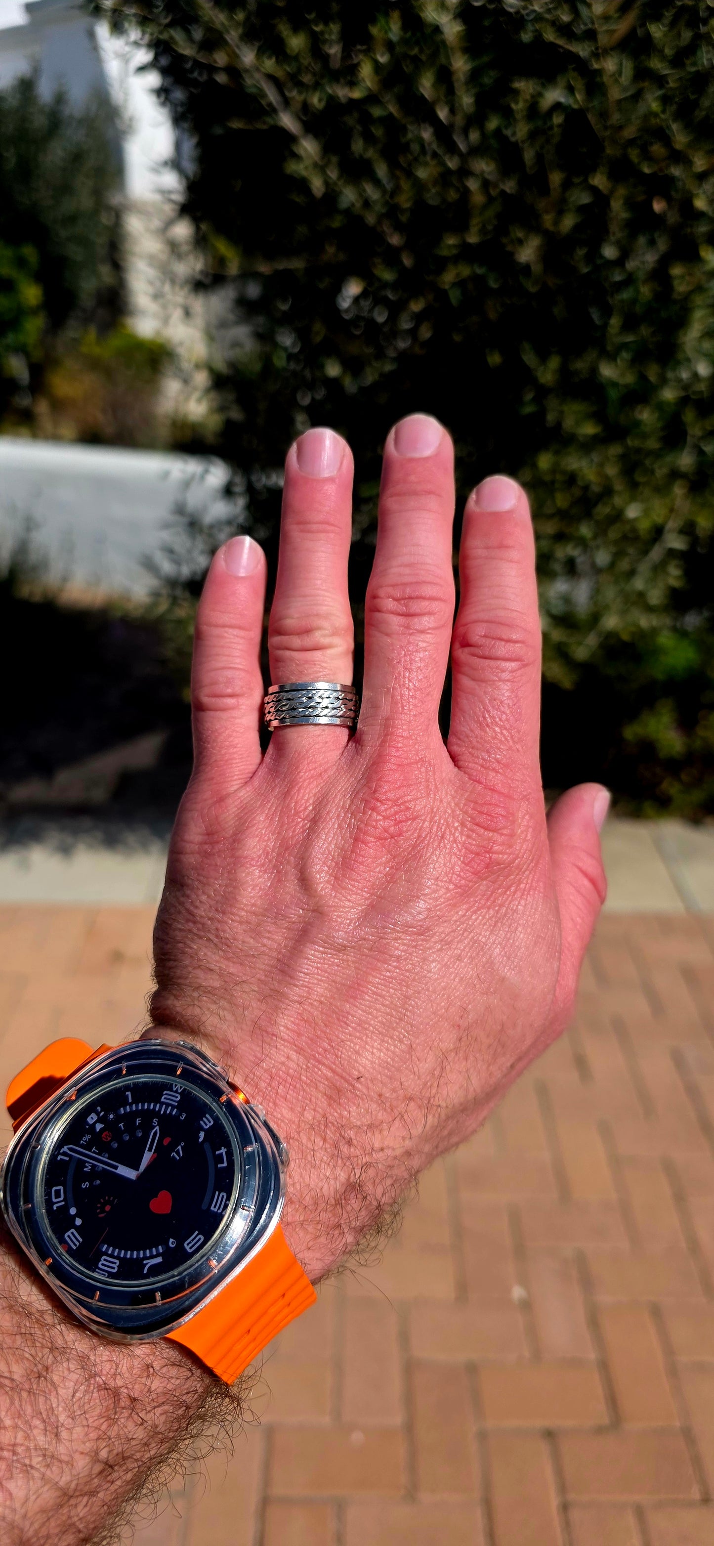 Fabulously tactile, chunky and beautifully UNISEX! This artisan-made spinner ring is crafted entirely in solid sterling silver, combining a substantial polished outer band with a wonderfully textured moving centre.
