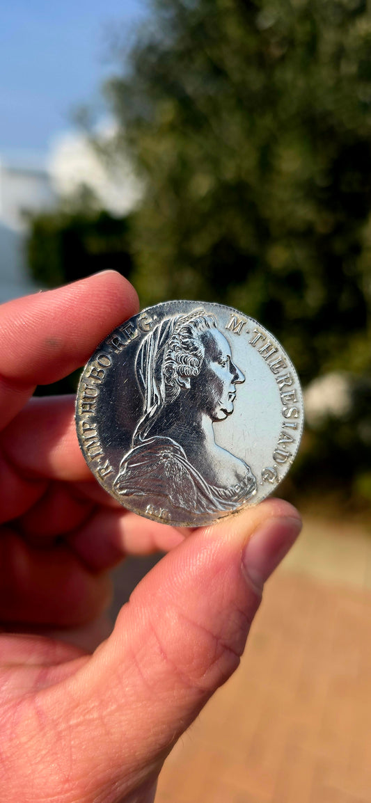 What a fabulous piece of history! Dating 1780, this iconic Maria Theresa Thaler is struck in substantial .833 silver, weighing approximately 28 grams and measuring 40 mm across.