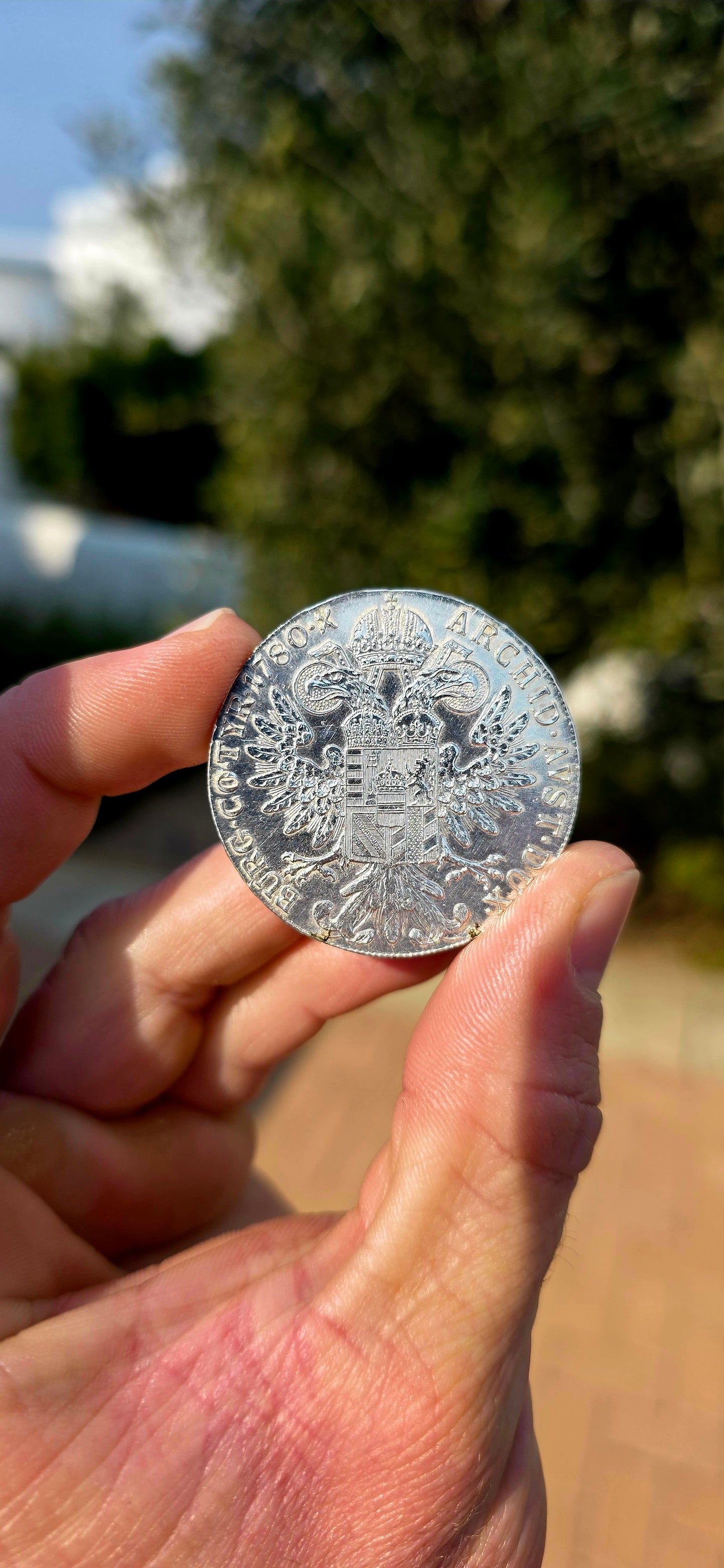 What a fabulous piece of history! Dating 1780, this iconic Maria Theresa Thaler is struck in substantial .833 silver, weighing approximately 28 grams and measuring 40 mm across.