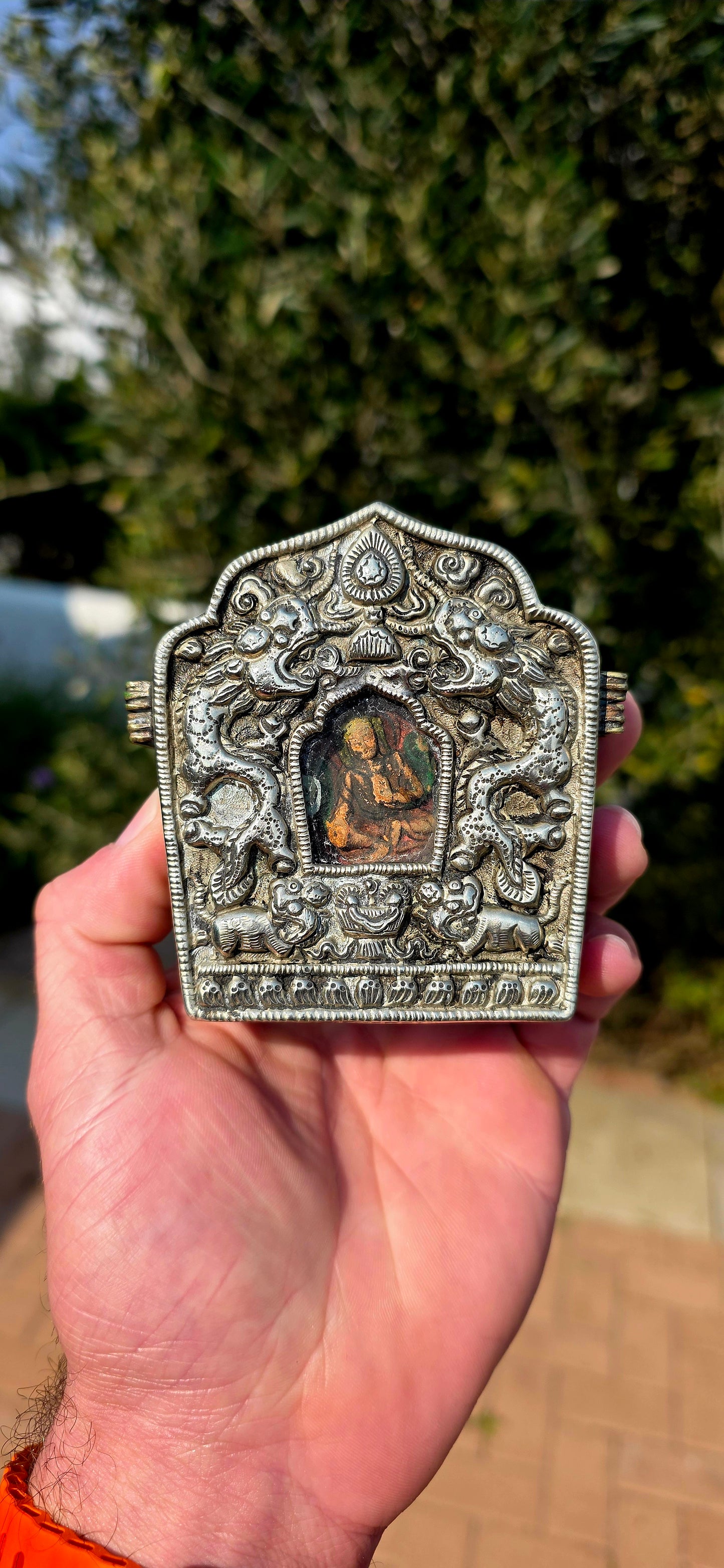 Now THIS is a special find! Dating to approximately the late 19th / early 20th century, c.1880–1910, this wonderful antique Tibetan Ga’u (Gau) portable prayer box / reliquary shrine is beautifully handcrafted from silver and copper.