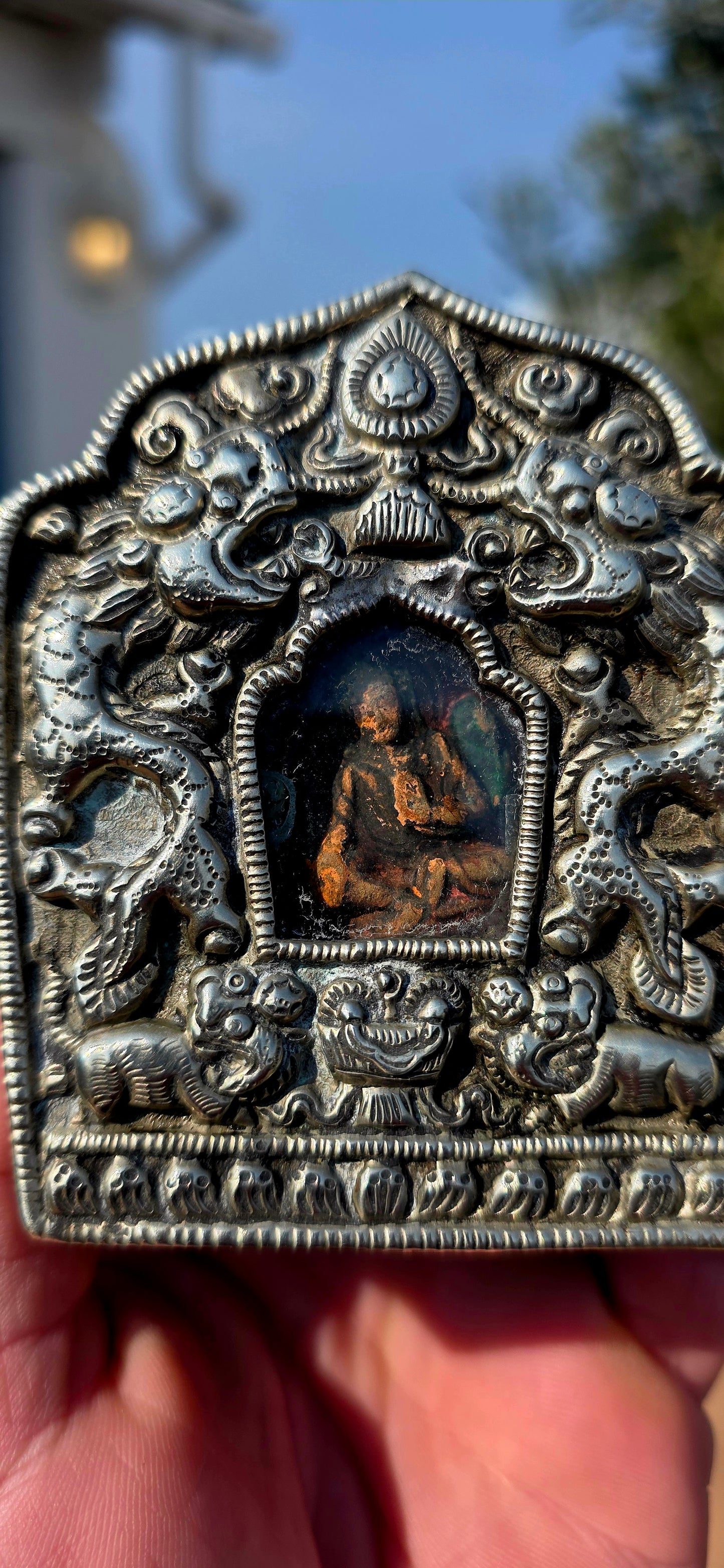 Now THIS is a special find! Dating to approximately the late 19th / early 20th century, c.1880–1910, this wonderful antique Tibetan Ga’u (Gau) portable prayer box / reliquary shrine is beautifully handcrafted from silver and copper.