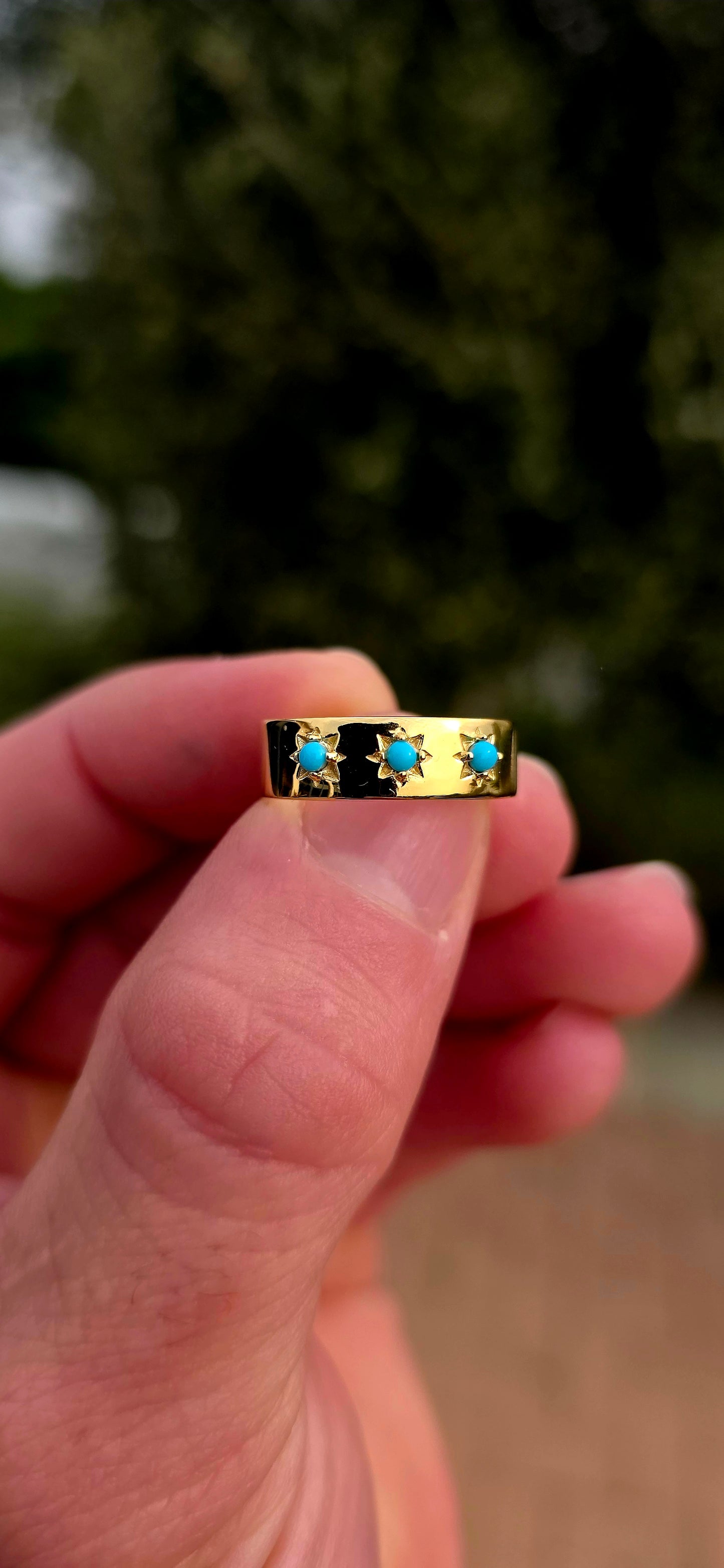 Quietly powerful, this unisex gypsy-style band has that wonderful old-world character with a bold pop of turquoise blue.